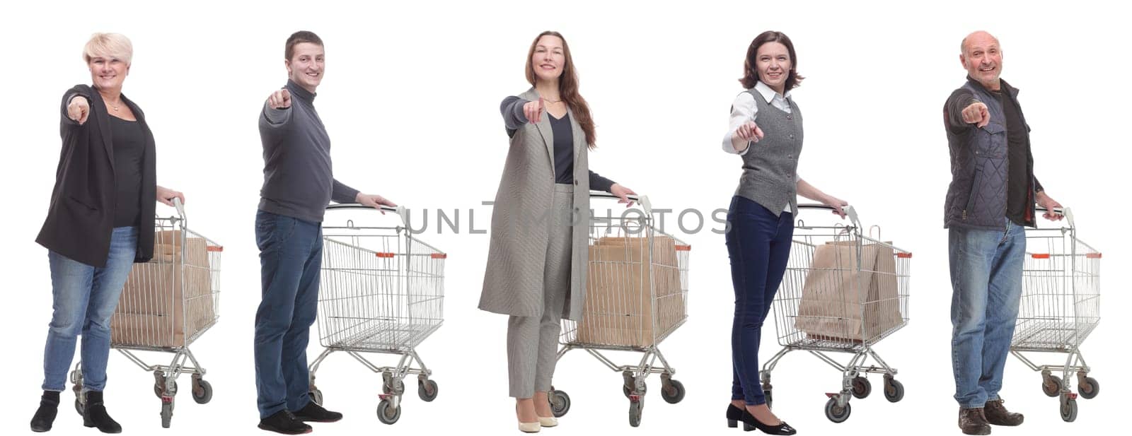 group of people with cart pointing finger at camera isolated on white background