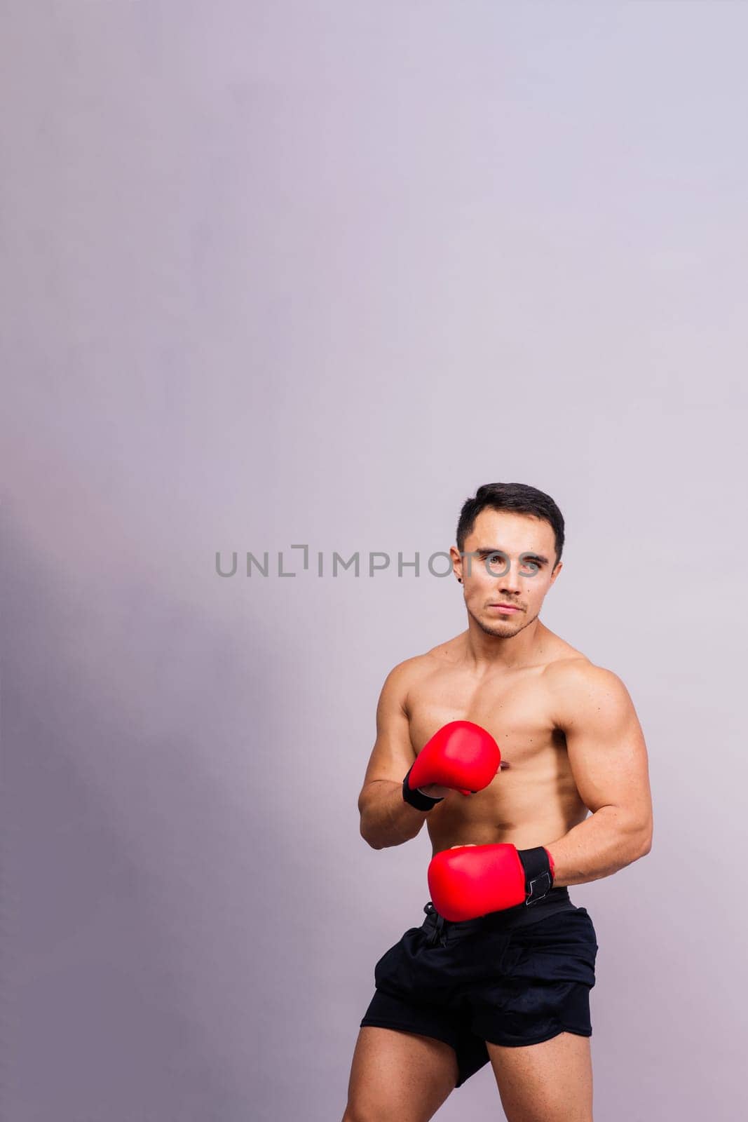 Training, young man and boxer with boxing gloves for competition, prepare for match by Zelenin