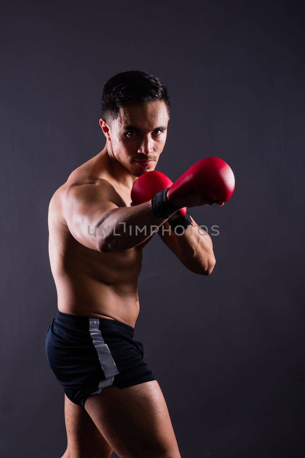 Training, young man and boxer with boxing gloves for competition, prepare for match by Zelenin