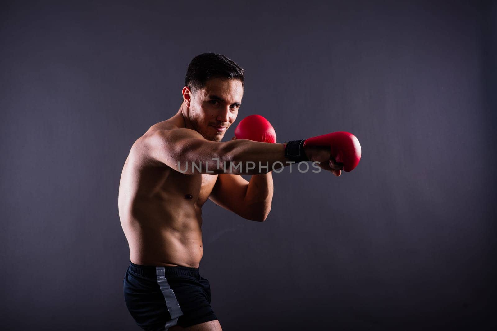 Training, young man and boxer with boxing gloves for competition, prepare for match by Zelenin