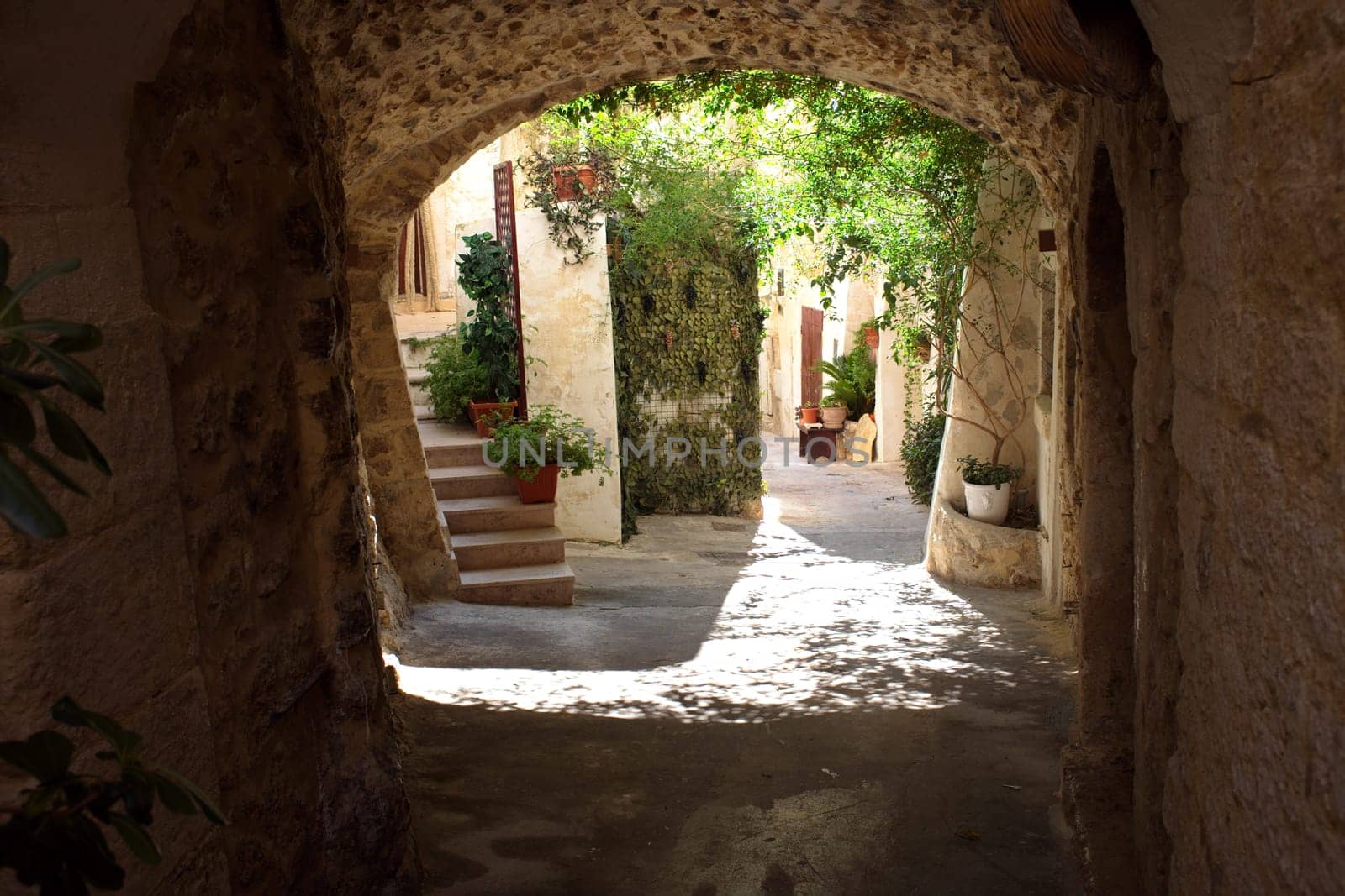 A picturesque alley in the old town of Vieste, a famous seaside town in Gargano National Park, Puglia, Italy