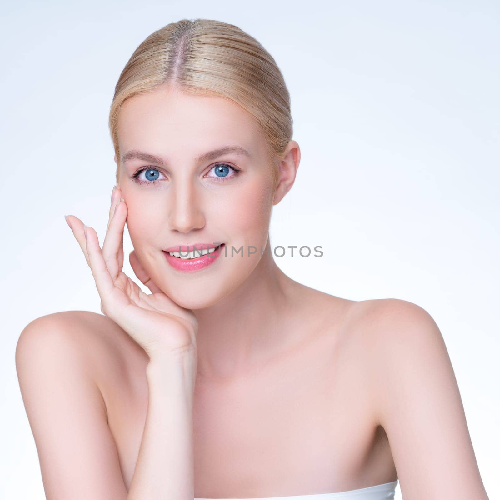 Personable beautiful woman portrait with perfect smooth clean skin and natural makeup portrait in isolated background. Hand gesture with expressive facial expression for beauty model concept.