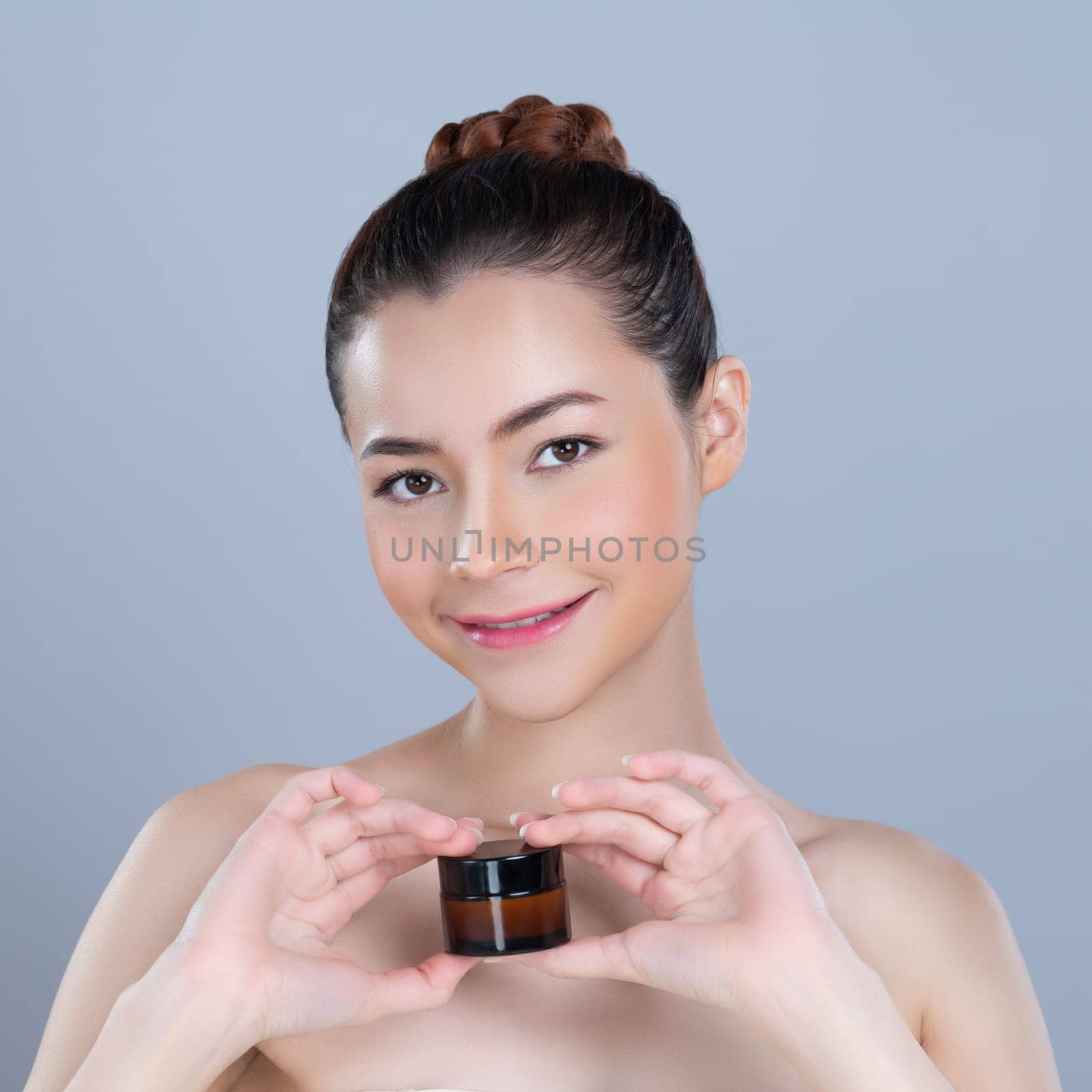 Glamorous beautiful perfect cosmetic skin with soft makeup woman portrait hold mockup jar cream or moisturizer for skincare treatment and anti-aging product advertisement in isolated background.