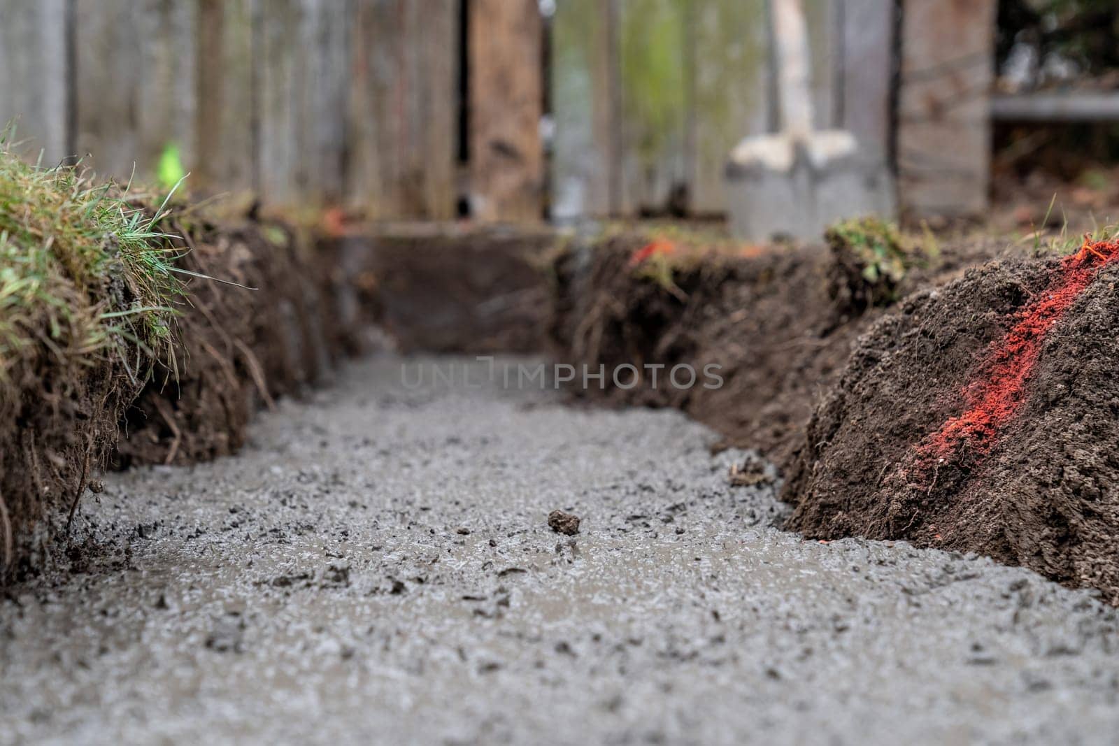 concrete foundation in the ground for building construction.