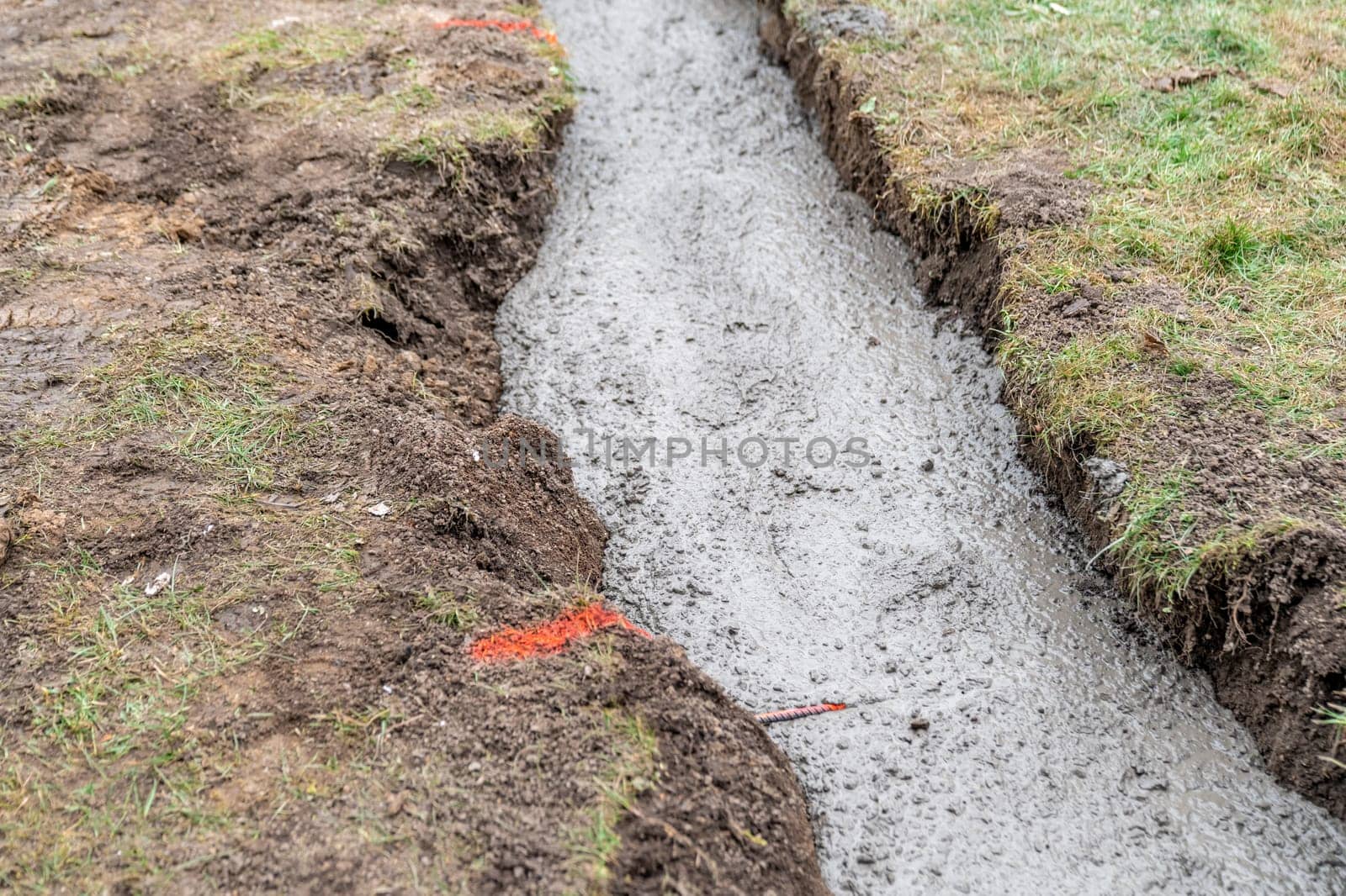concrete foundation in the ground for building construction.