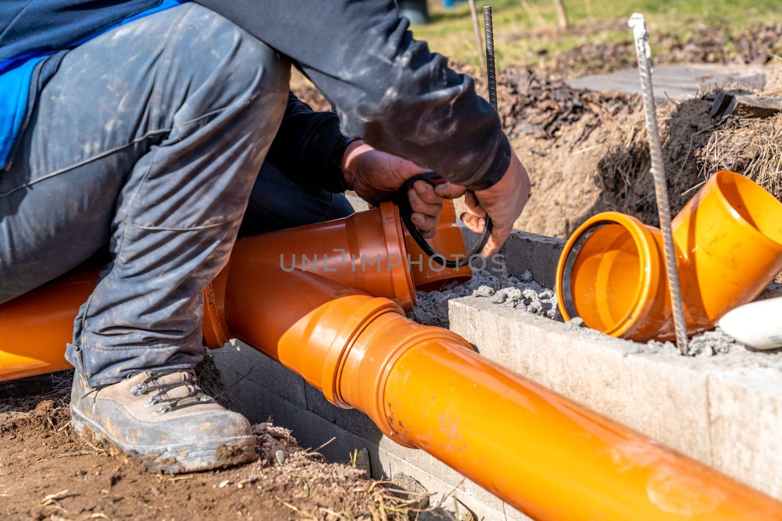 PVC plastic pipe for sewerage in the ground.
