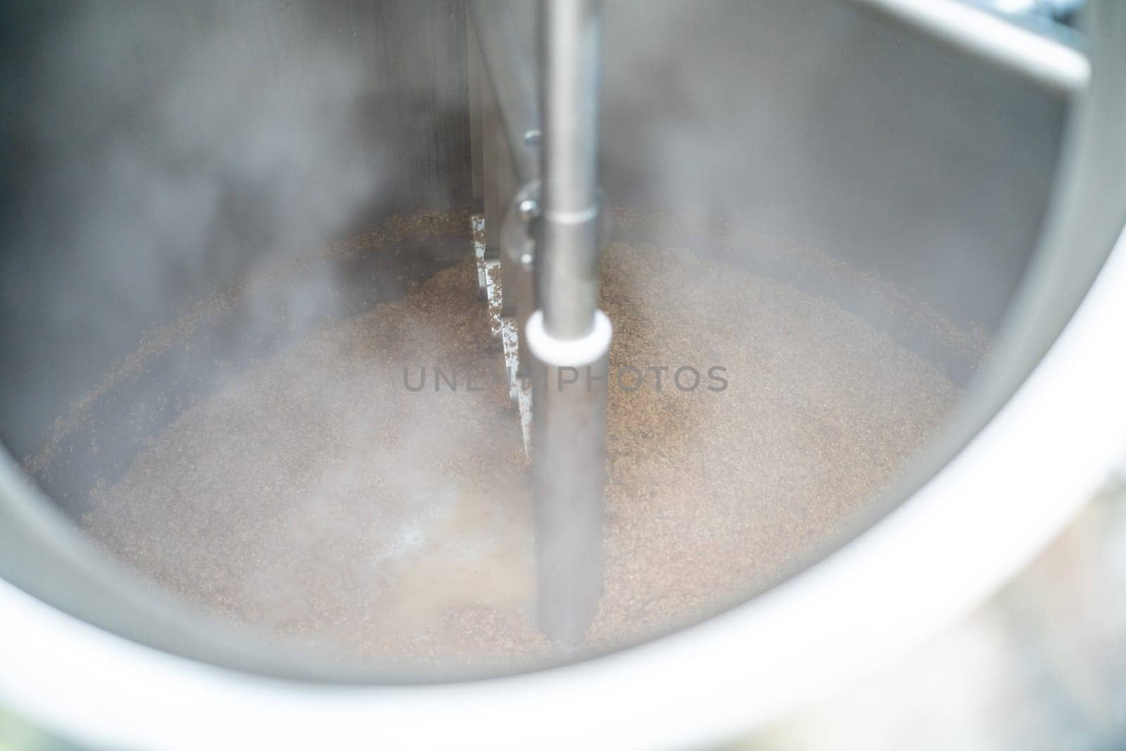 stainless steel boiler for brewing beer in a brewery. High quality photo