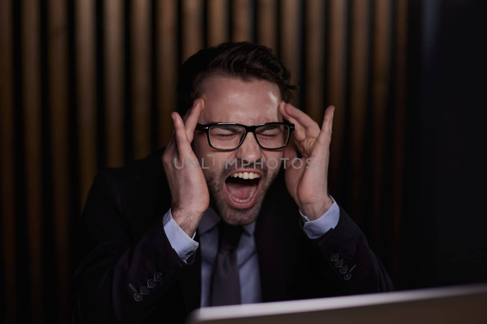 image of businessman stressed out at work