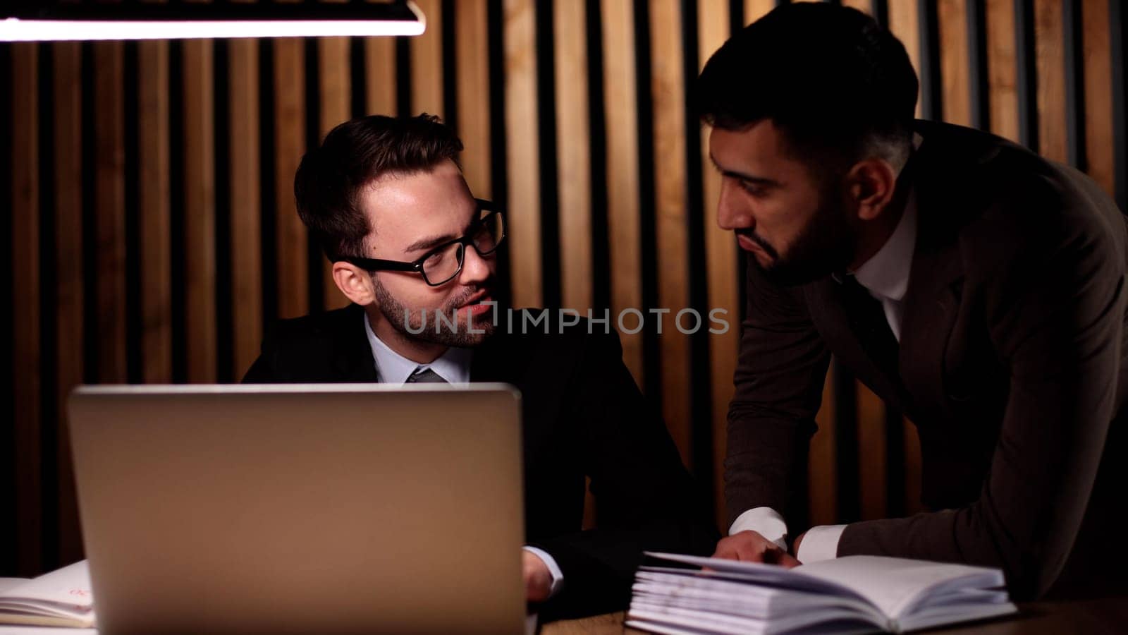 Interview with a happy, excited and confident human resources manager talking to a shortlist candidate for a job.