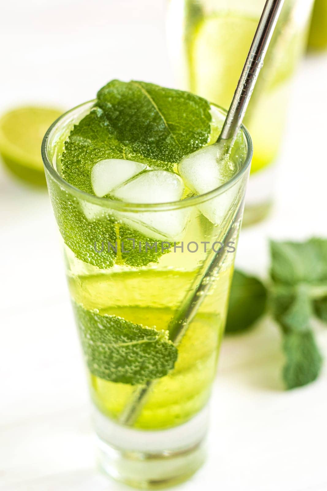 Mojito summer refreshing cocktail with ice and mint by Suietska