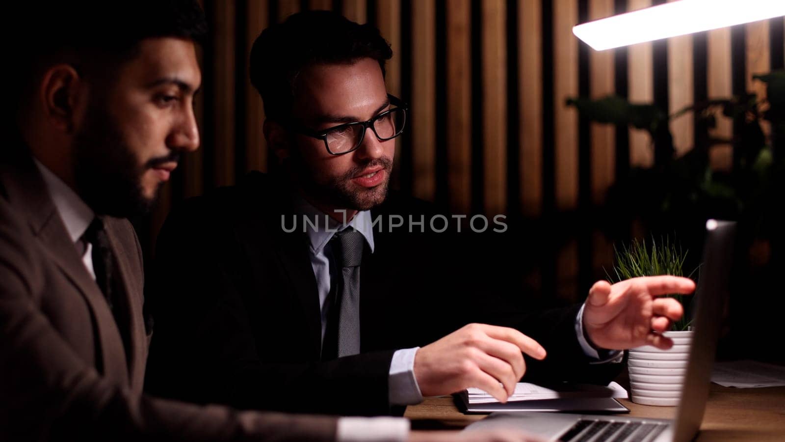 business colleagues sitting at the table in the office