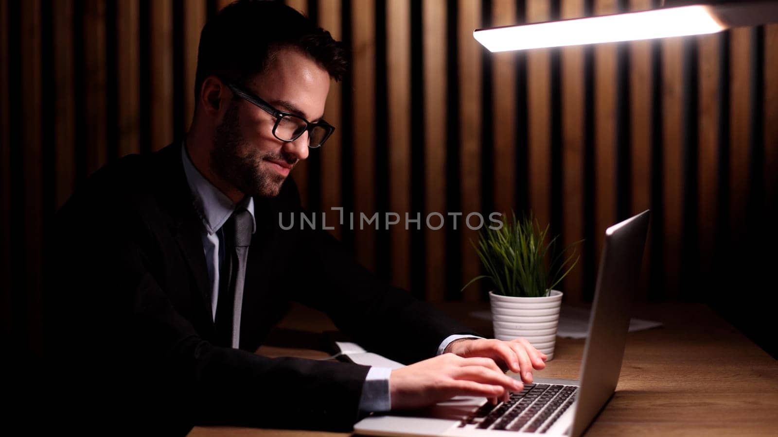 Portrait man, businessman, company founder, office worker sitting in the office