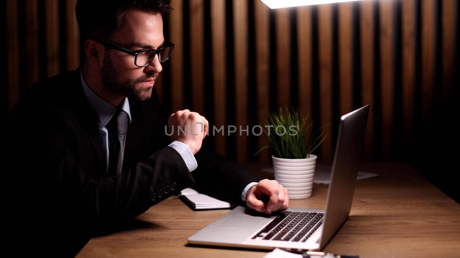Portrait man, businessman, company founder, office worker sitting in the office