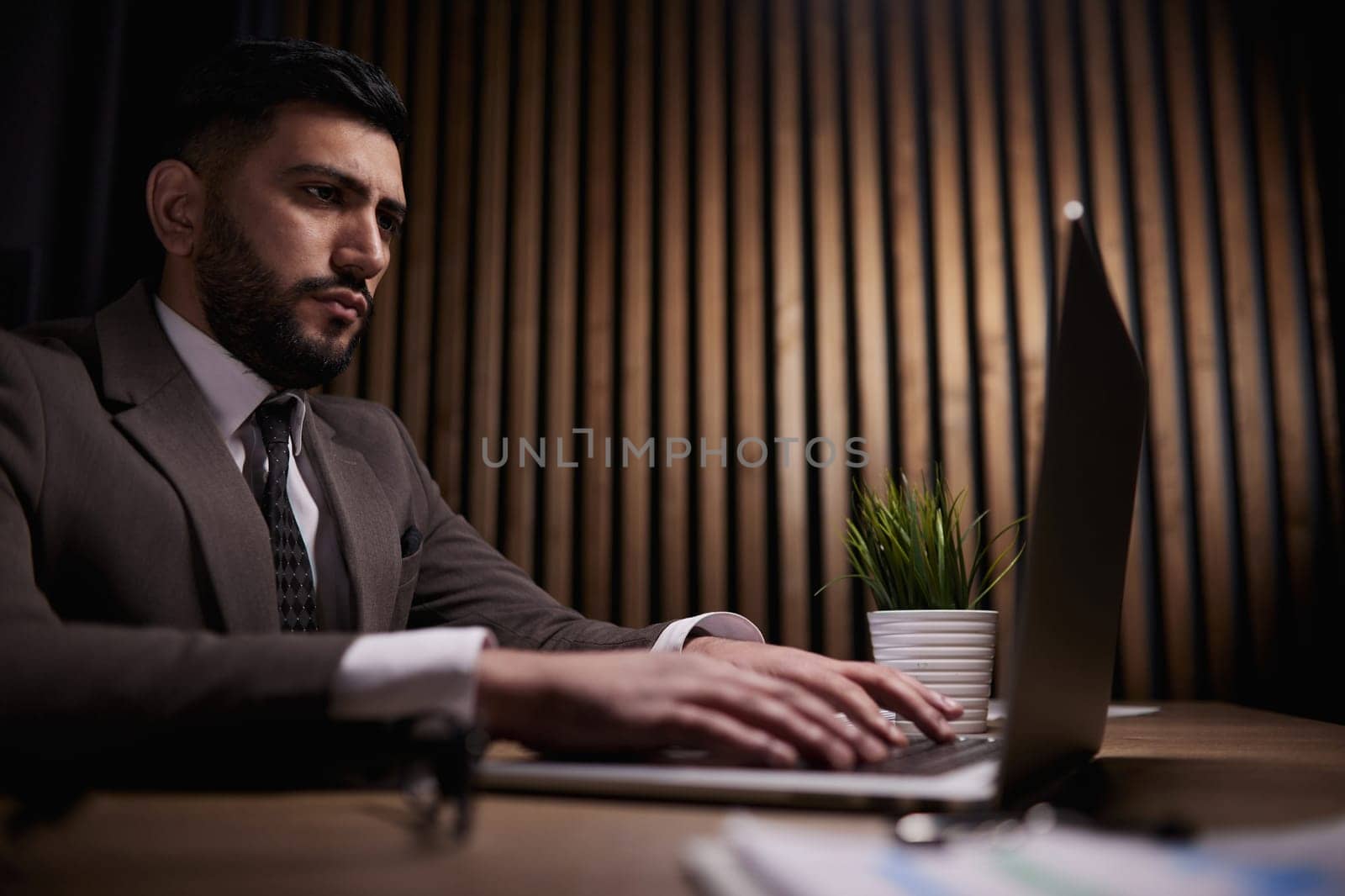 Man working on a laptop in the office