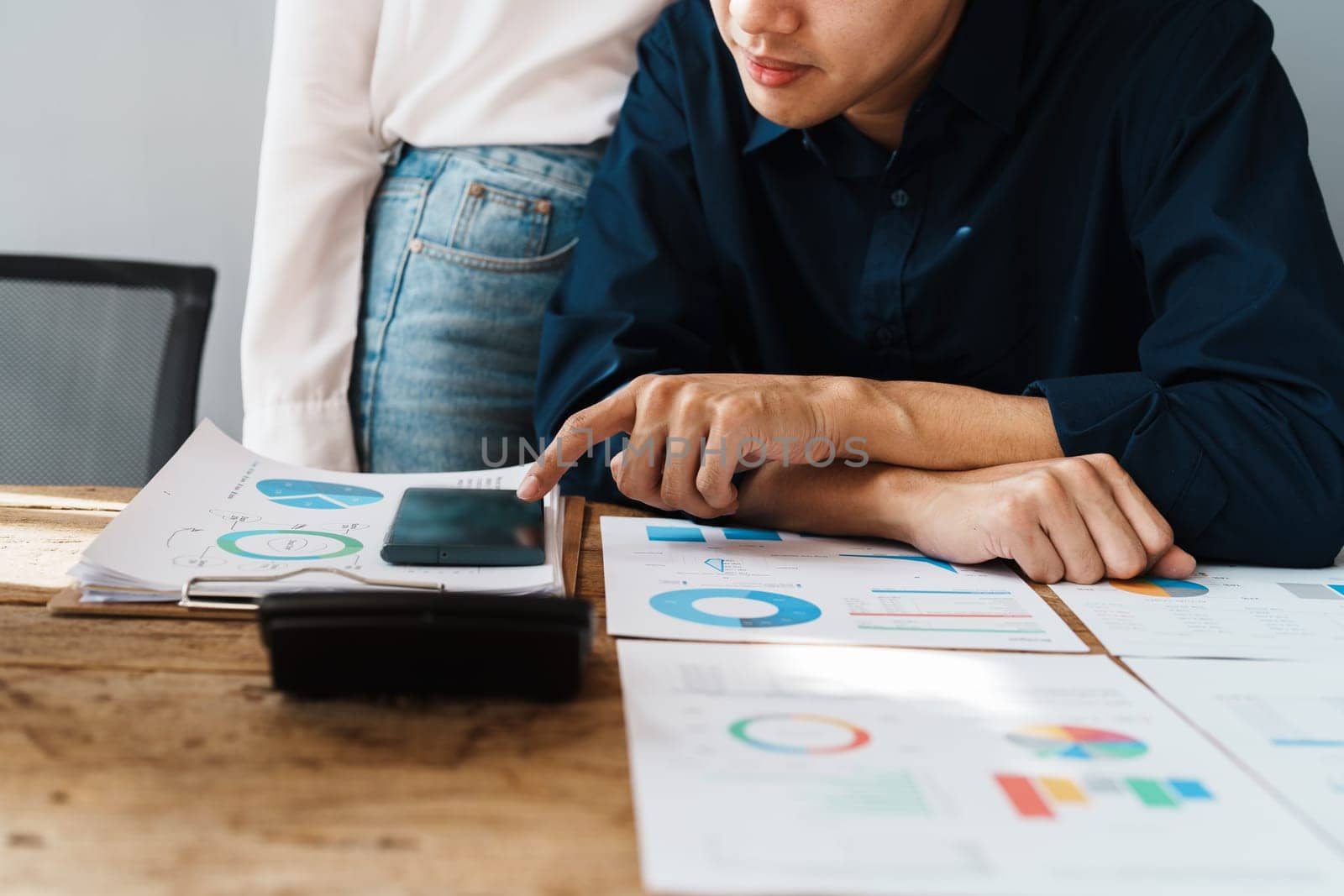 Startup family business, husband and wife discussing financial affairs, investing, making profit, tax deduction from trading using computer and investment budget paperwork working.