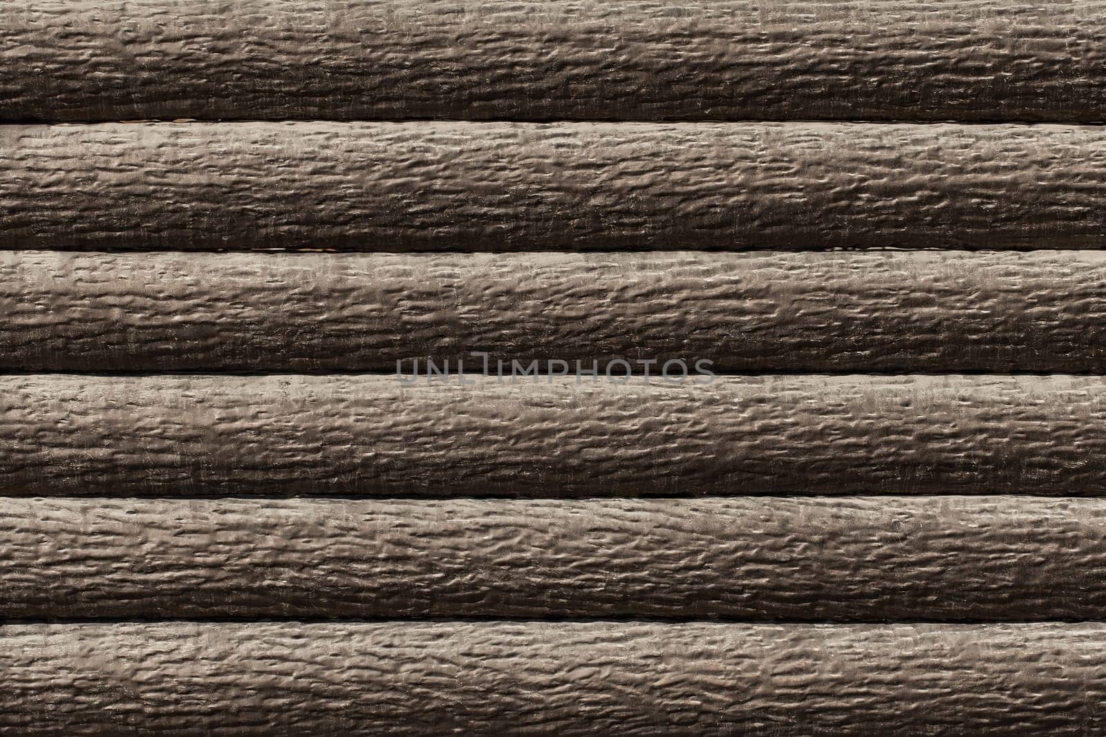 Dark brown horizontal logs fence modern interior wood texture background.