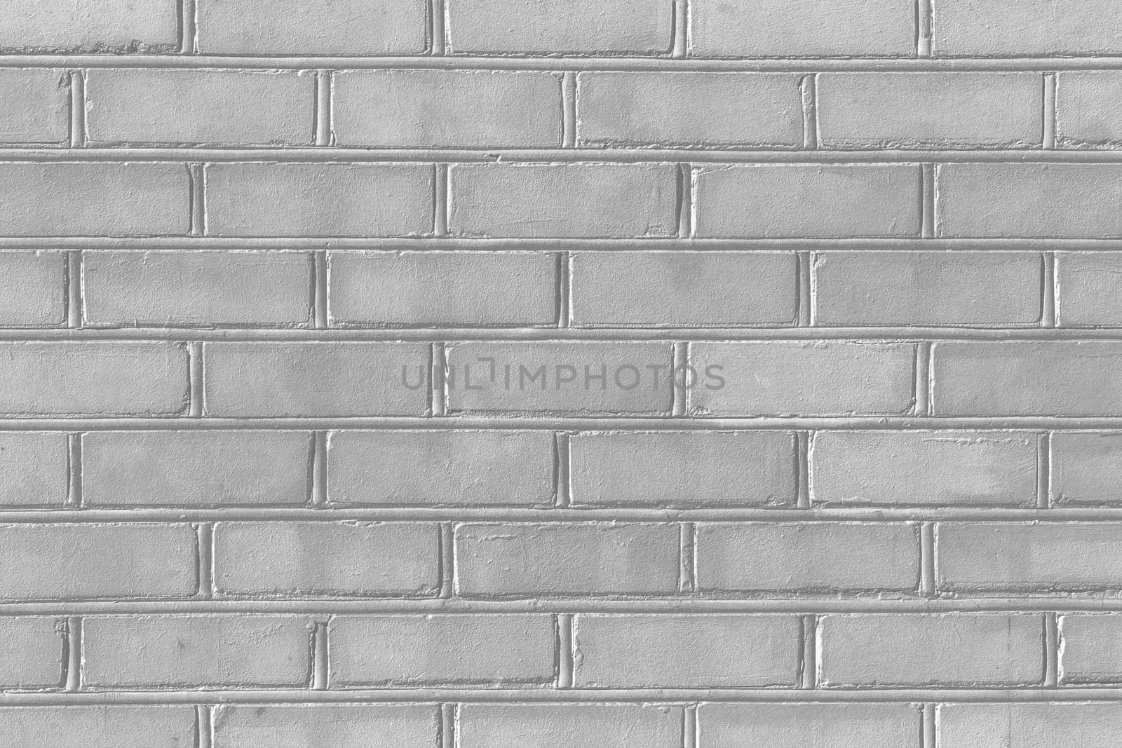 Grey paint on brick old gray wall texture background abstract pattern stone.