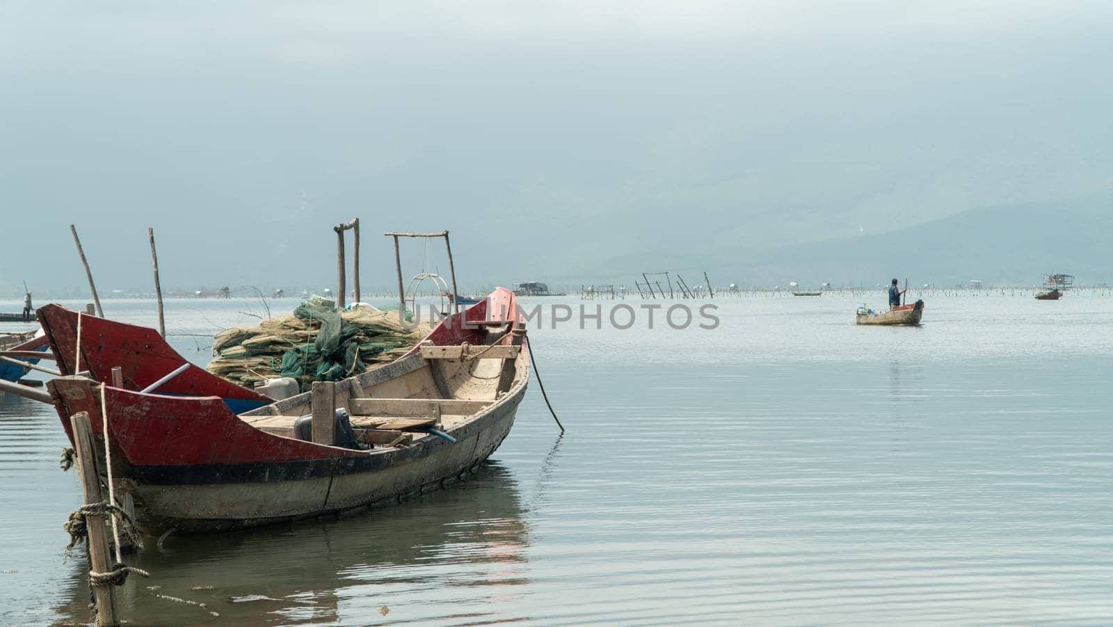 Fishing boat in the river with tackle nets. High quality photo