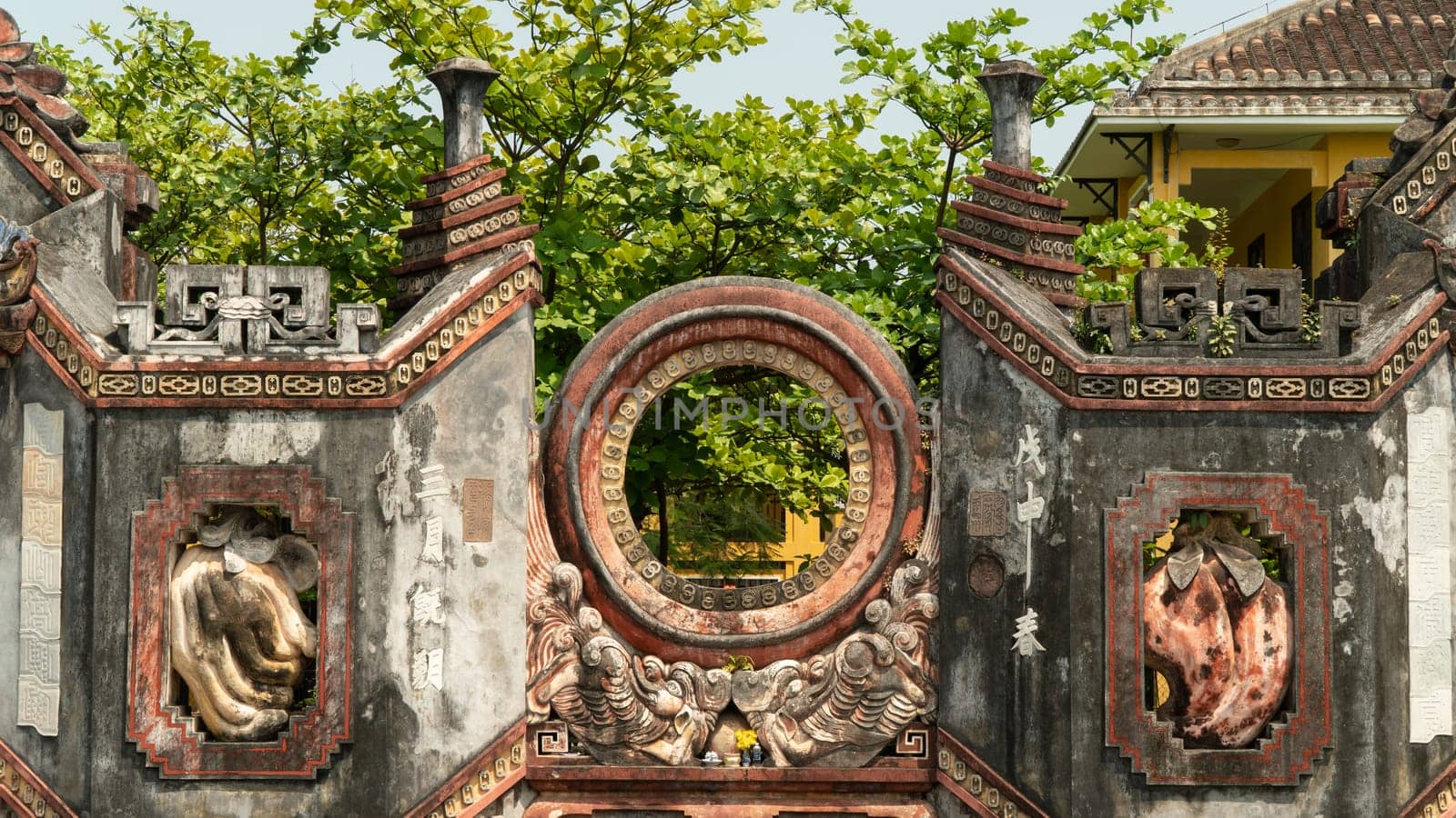 Old temple wall with round frame. High quality photo