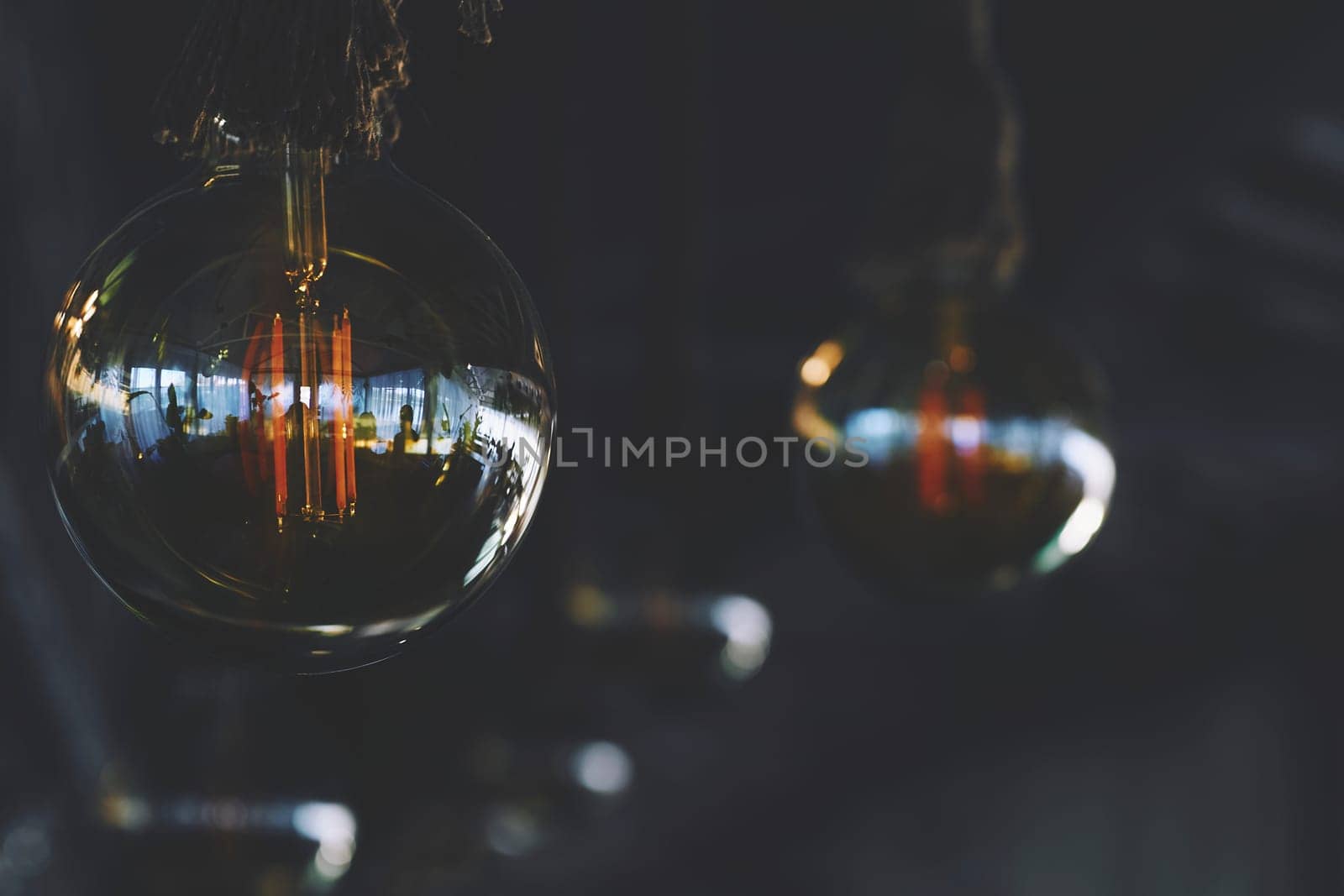 a device for giving light, either one consisting of an electric bulb together with its holder and shade or cover