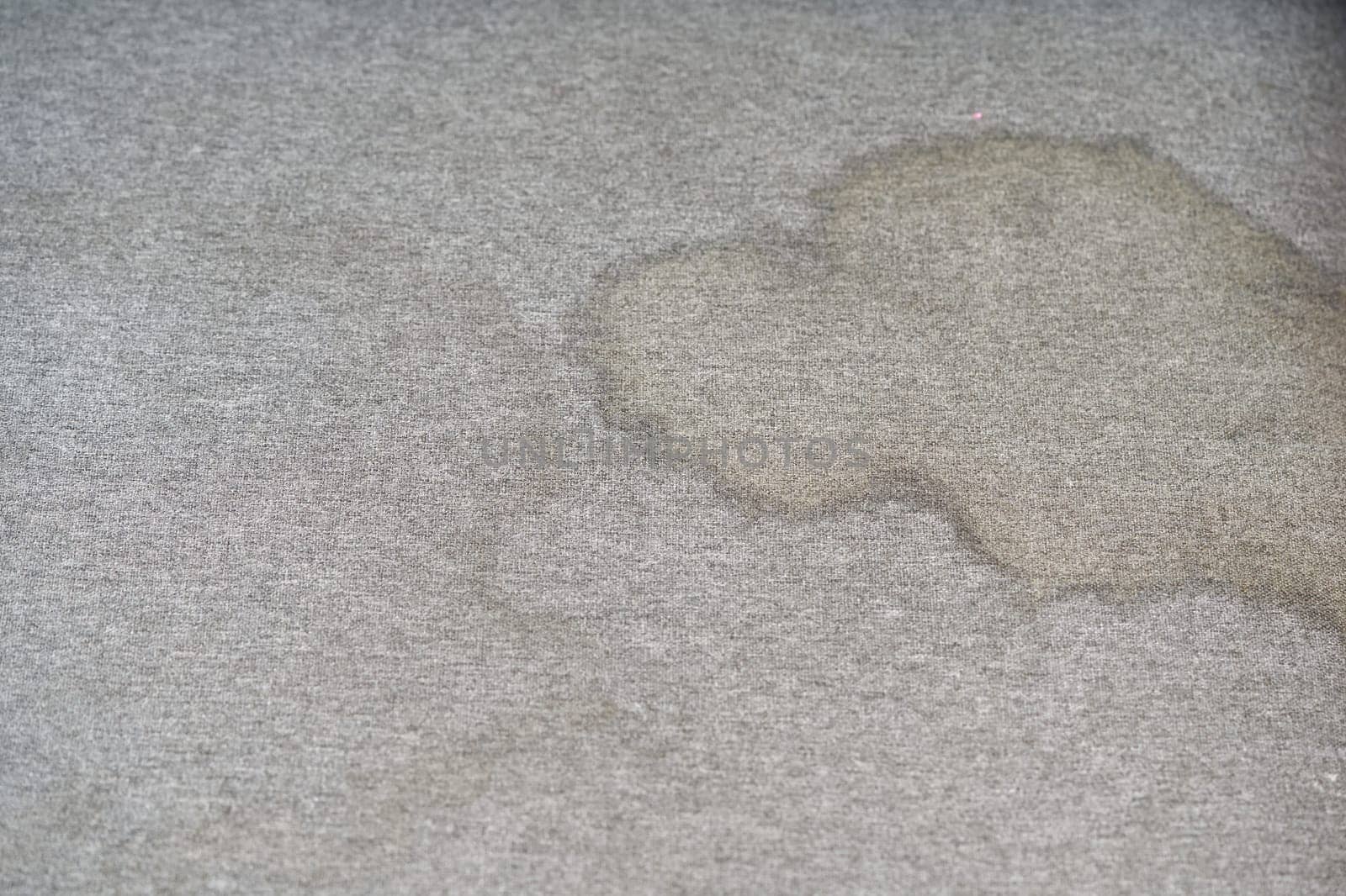 Dirty, stain, blot , fleck of water on the fabric, textile sofa. Dirty textile sofa chemical cleaning Dirty textile sofa chemical cleaning. upholstered furniture cleaning concept