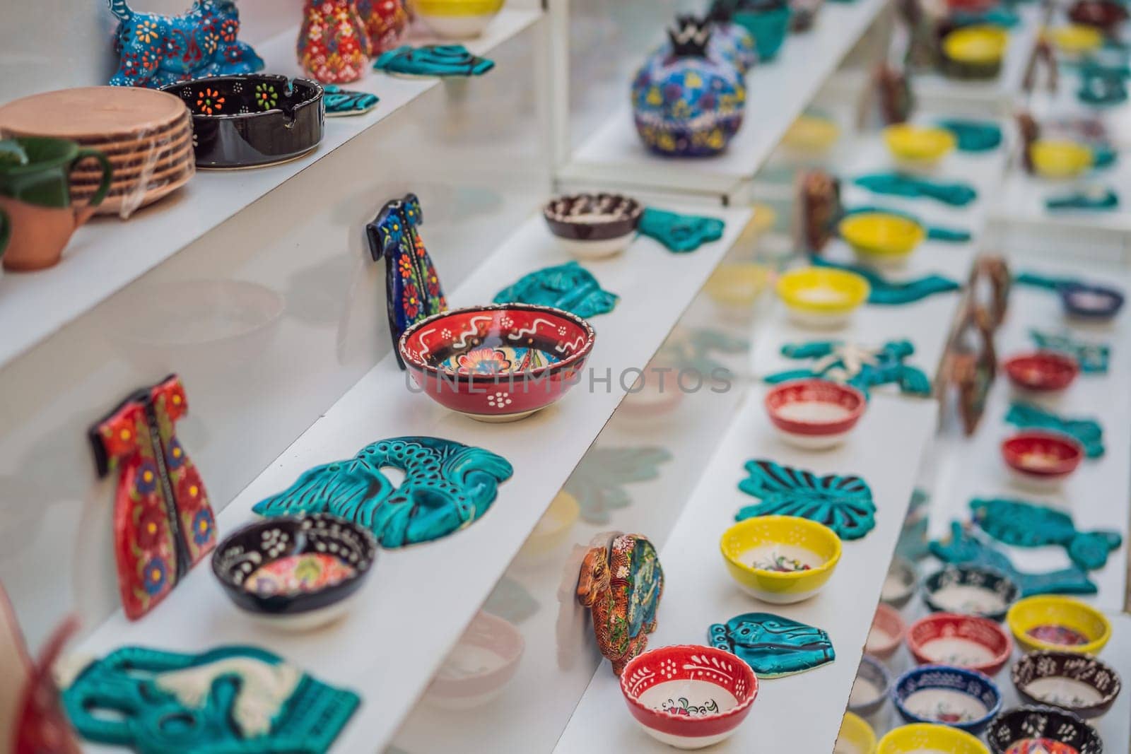 Collection of turkish ceramics on sale at the Grand Bazaar in Istanbul, Turkey. Turkish colorful ornamental ceramic souvenir plates by galitskaya