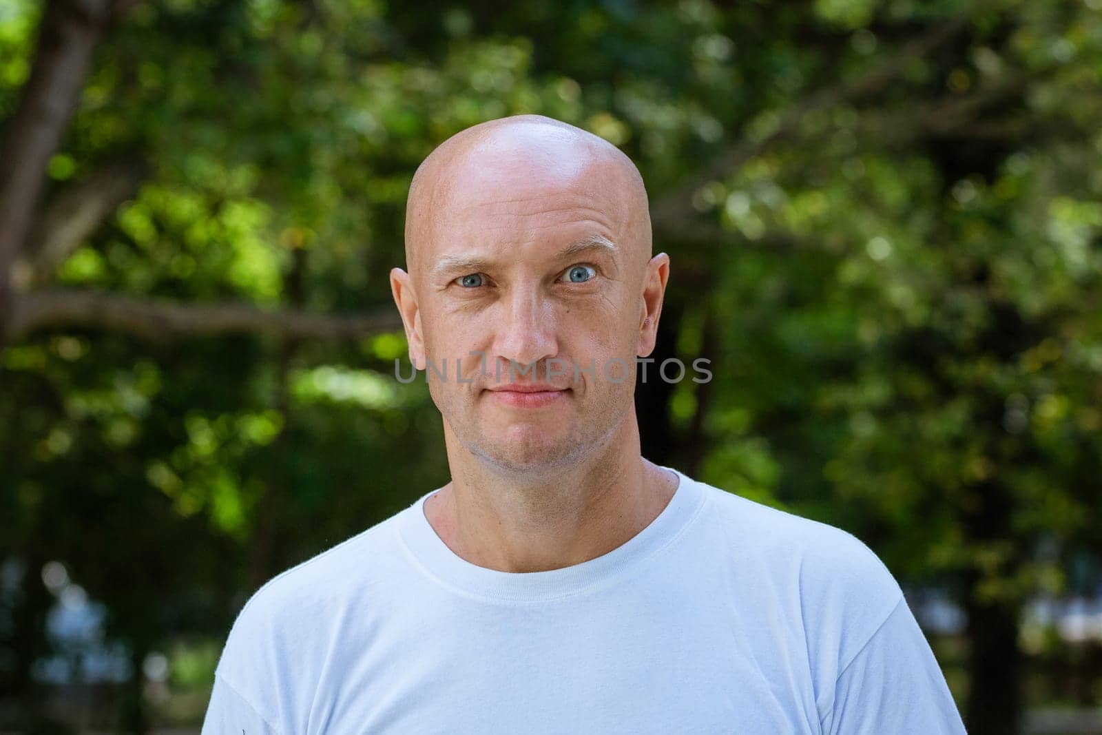 portrait of a bald man on a park background by EkaterinaPereslavtseva