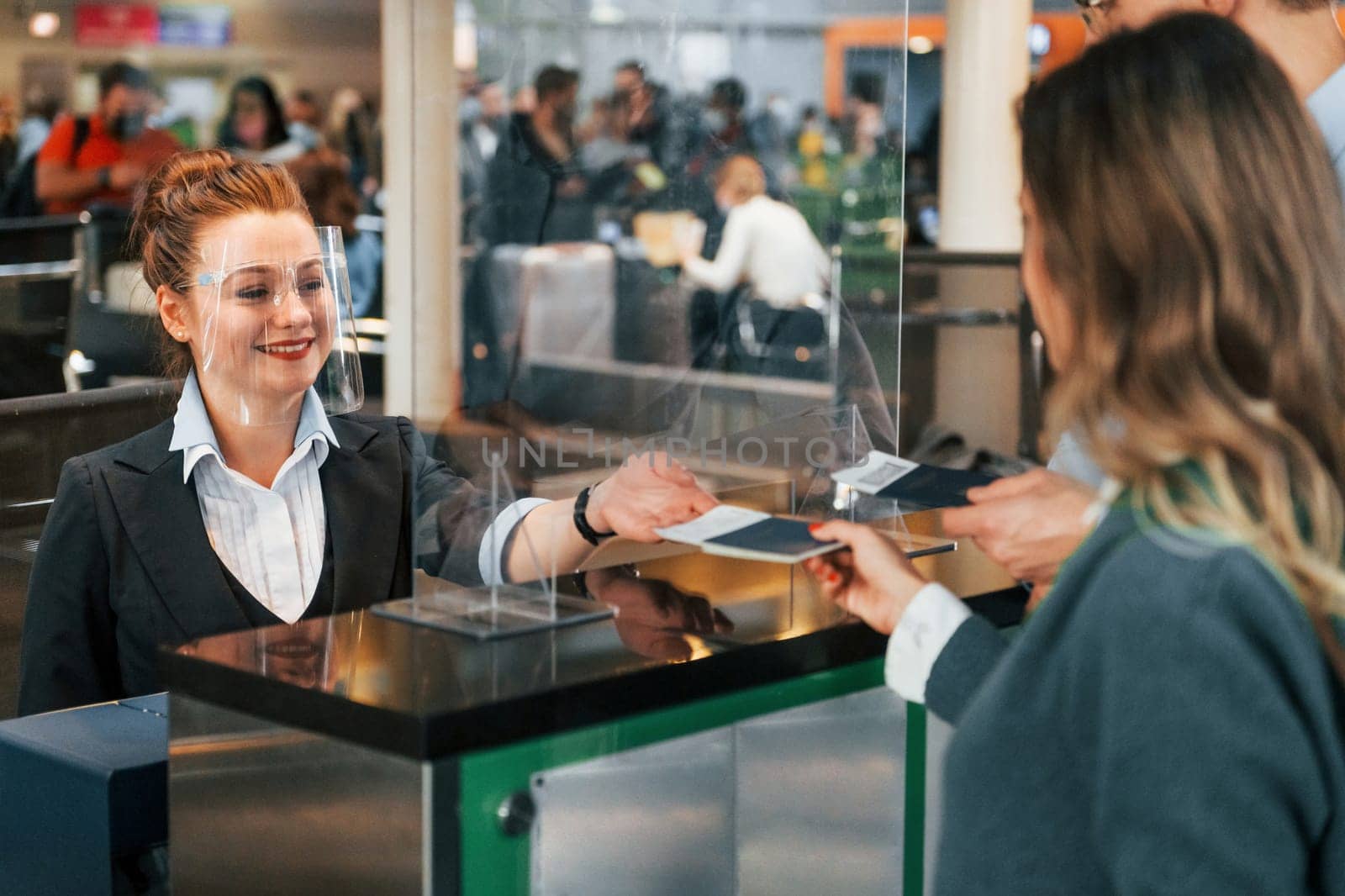 Professional service. Young couple is in the airport together.