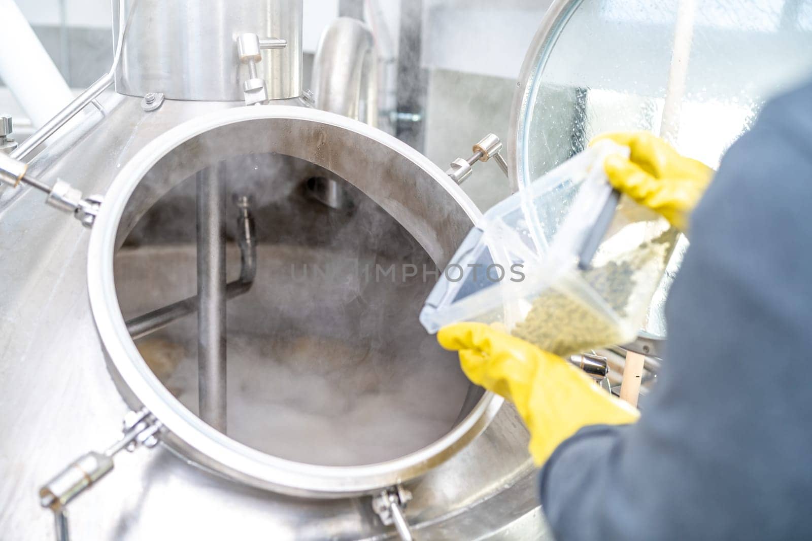 dried granulated hops in the brewery when brewing beer