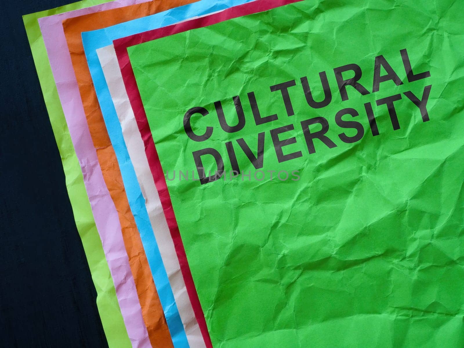 Multi-colored sheets of paper with the inscription cultural diversity. by designer491