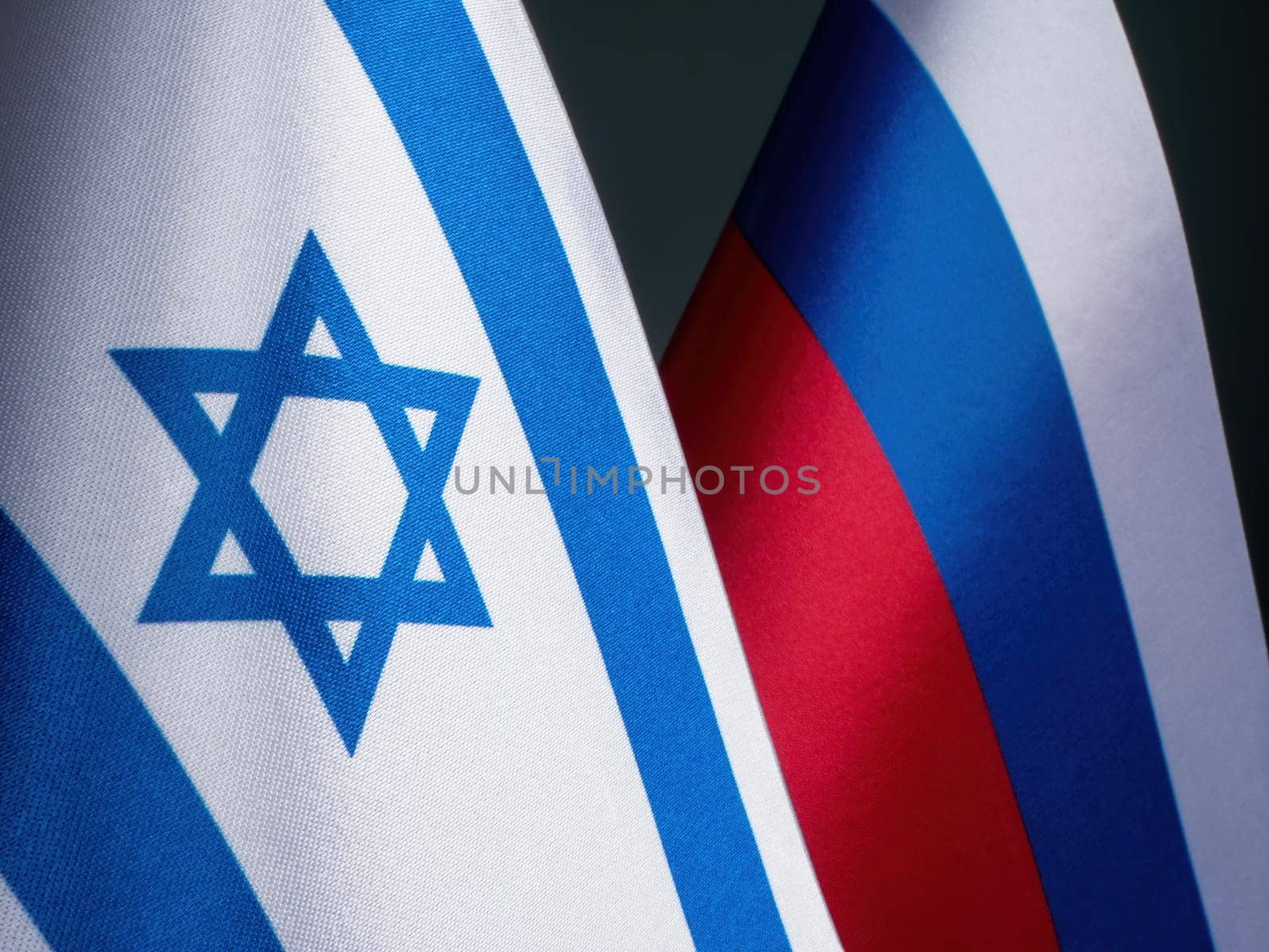 Flag of Israel next to the flag of Russia. by designer491