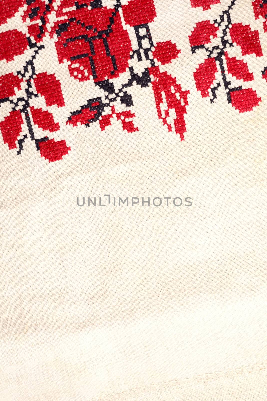 Line striped closeup weave fabric for kitchen towel material. Pinstripe fiber picnic table cloth . Black and red embroidery. Beige white farmhouse style stripes texture. Woven linen cloth pattern background. Embroidered good like old handmade cross-stitch ethnic Ukraine pattern. Ukrainian rushnyk . Red version over white background. by aprilphoto