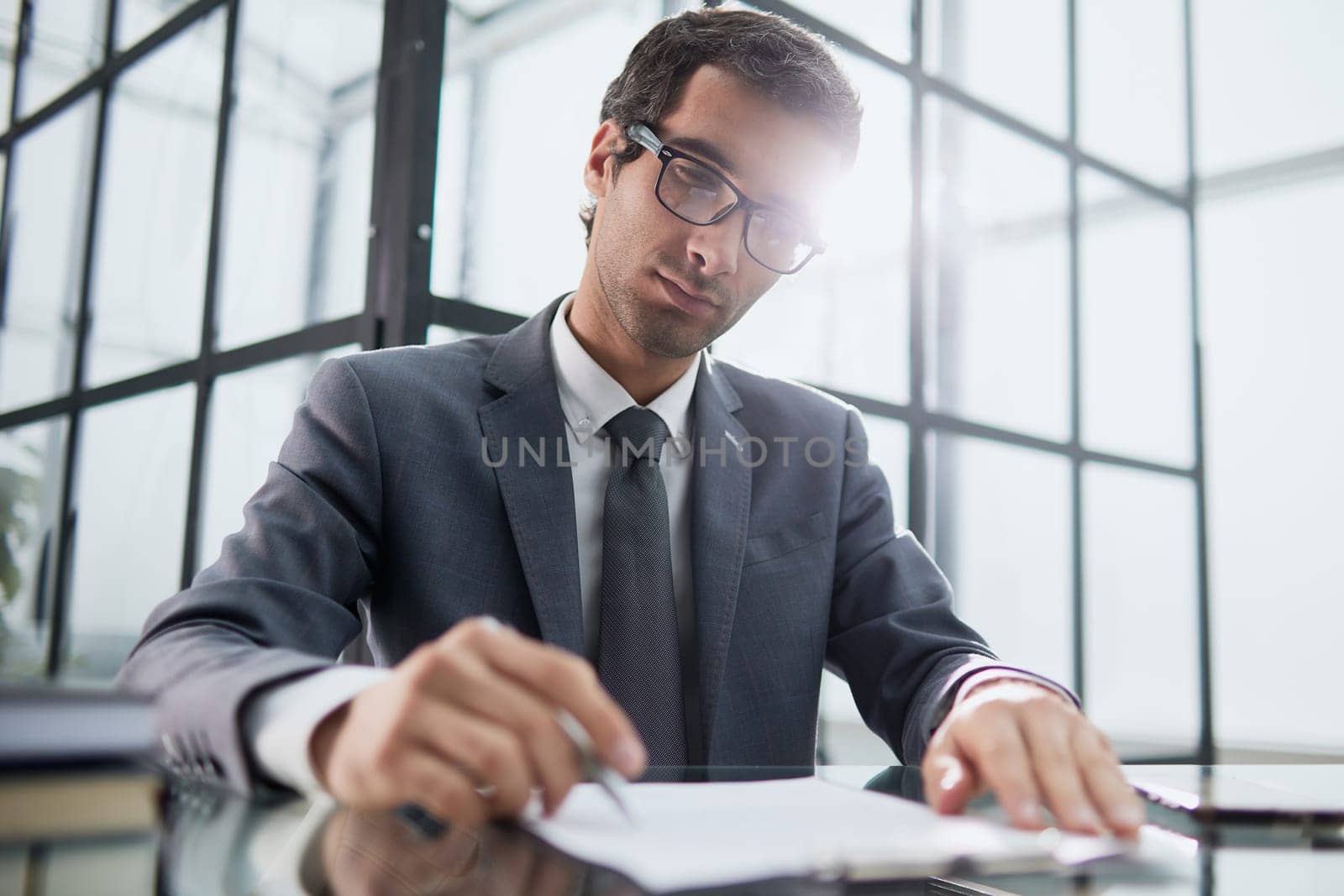 business man working in office analyzing financial data doing research