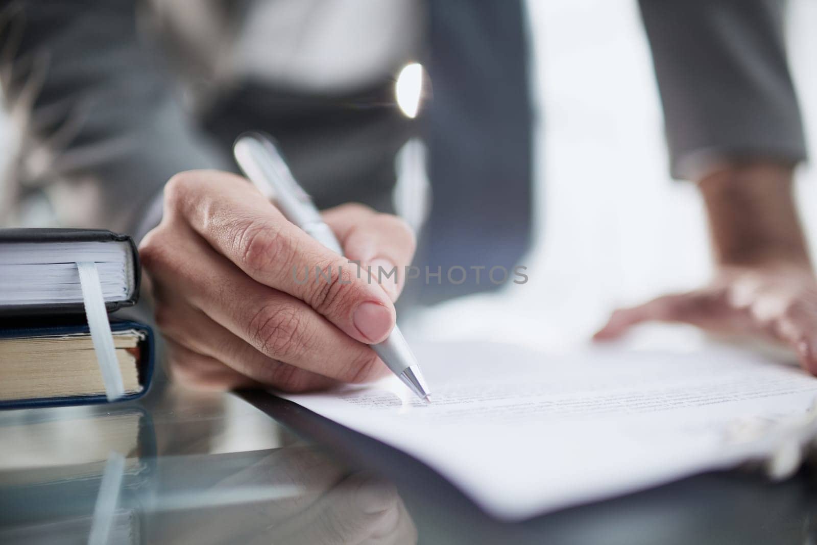 executive ceo manager writing notes in notebook at workplace.