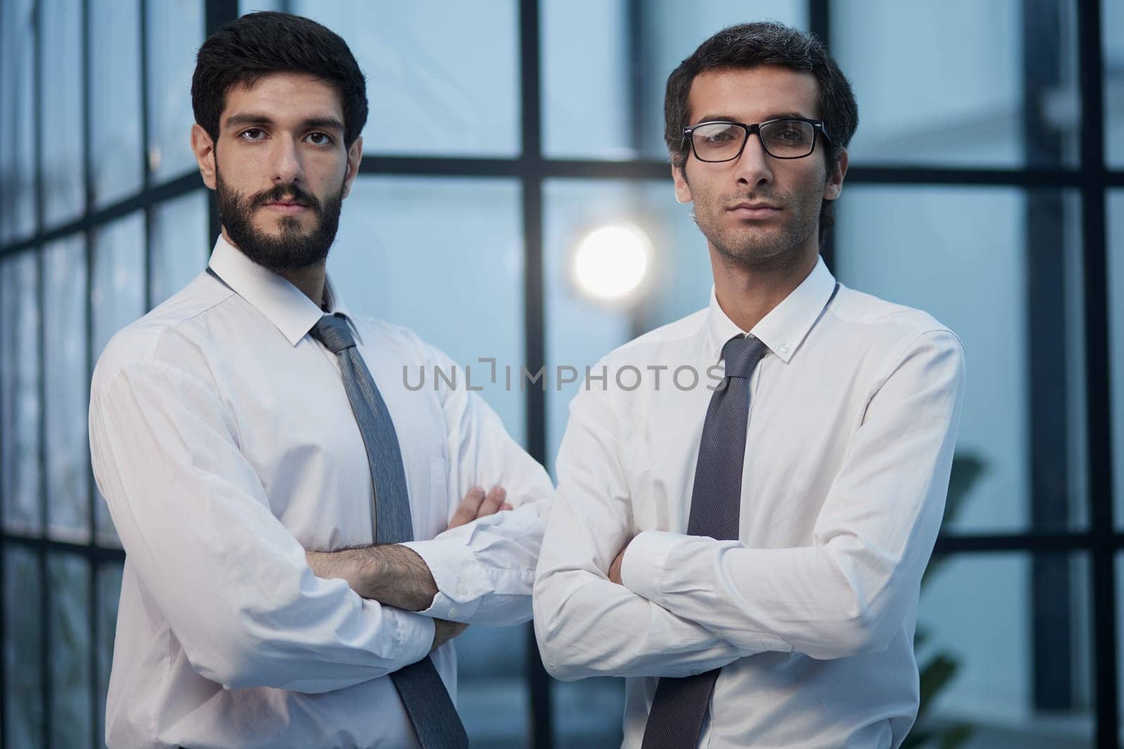 business people stand in front of the office