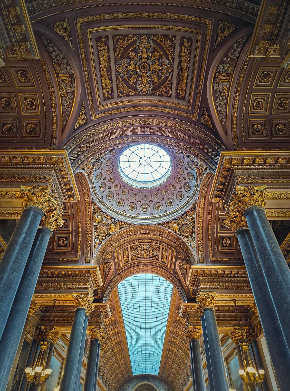 Achitectural details with the glass ceiling and golden ornaments inside the Versailles palace hall, Gallery of Great Battles, the largest room in the castle of the sun king Louis XIV by psychoshadow