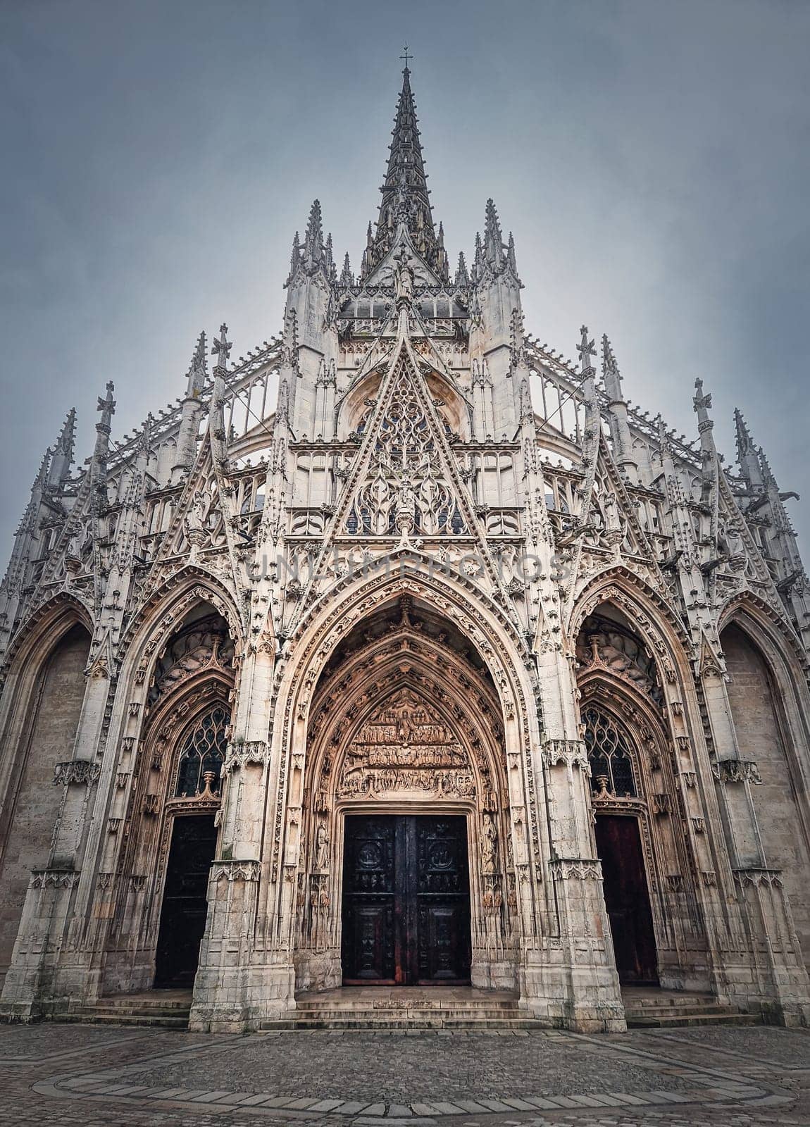 Outdoor facade view of Saint Maclou Church of Rouen in Normandy, France. Flamboyant gothic architectural style by psychoshadow