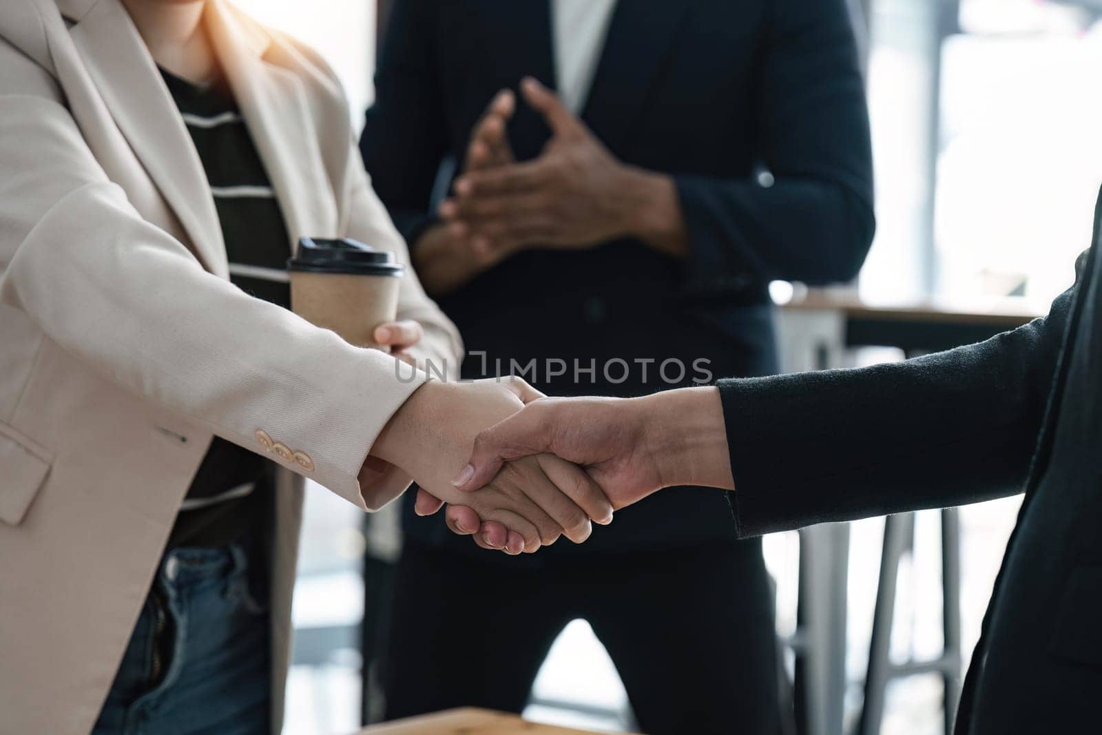 Handshake of business People deal business. The concept of hiring a lawyer for legal proceeding.