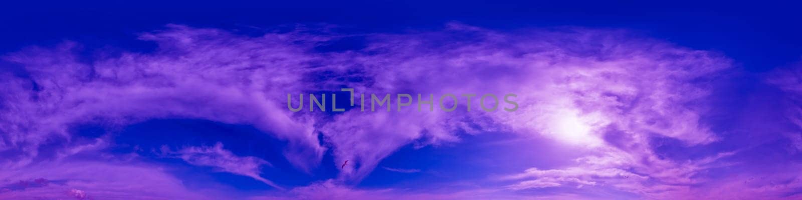Blue magenta sky panorama with Cirrus clouds in Seamless spherical equirectangular format. Full zenith for use in 3D graphics, game and editing aerial drone 360 degree panoramas for sky replacement.
