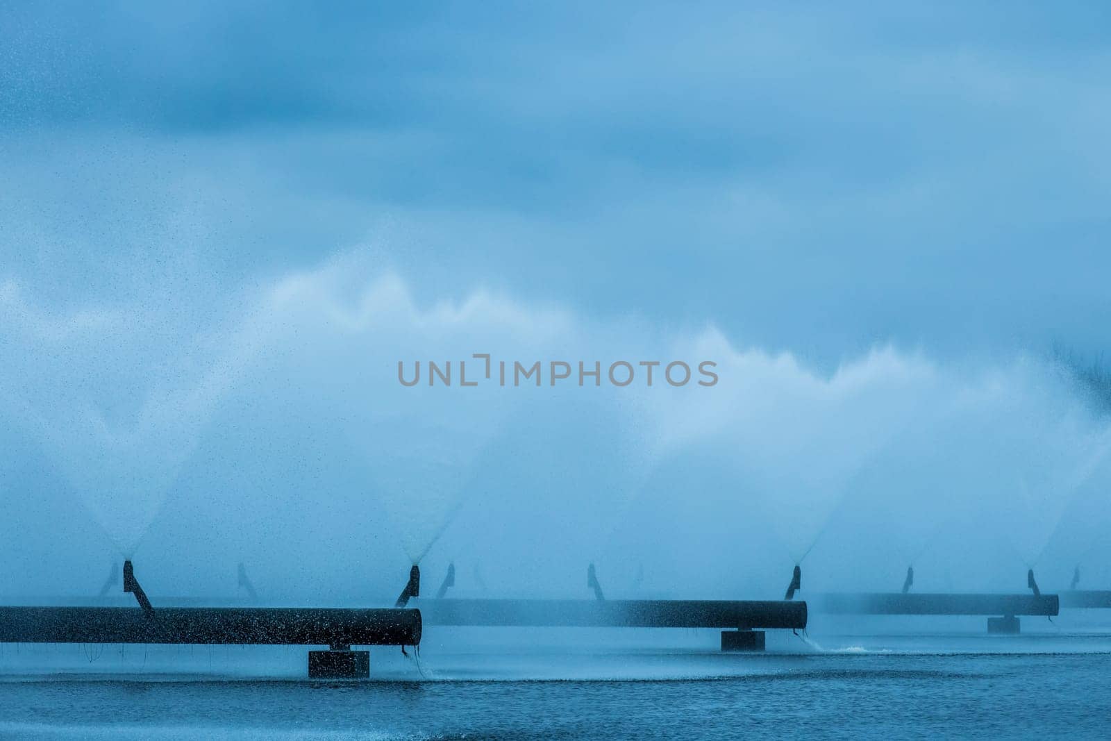 Old steel pipes of the water cooling pipeline system of the combined heat and power industrial plant.