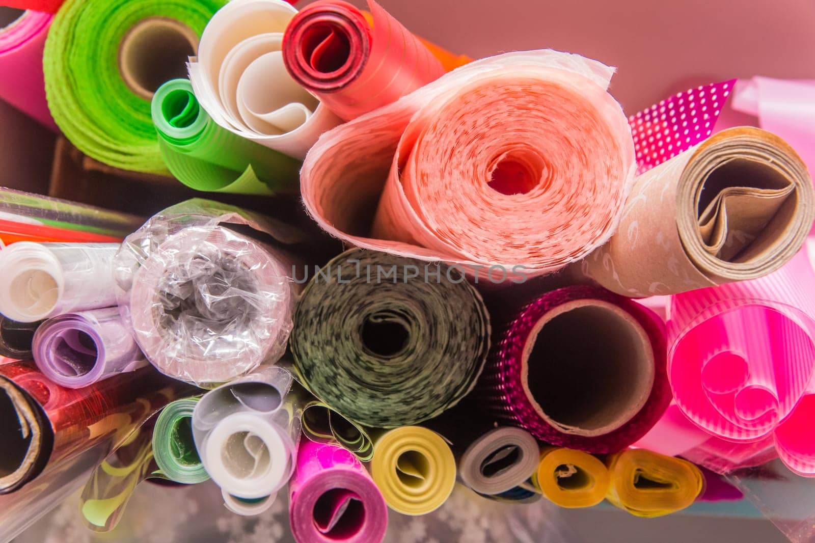 Rolled up plastic or polyethylene colored packaging object wrapper material.