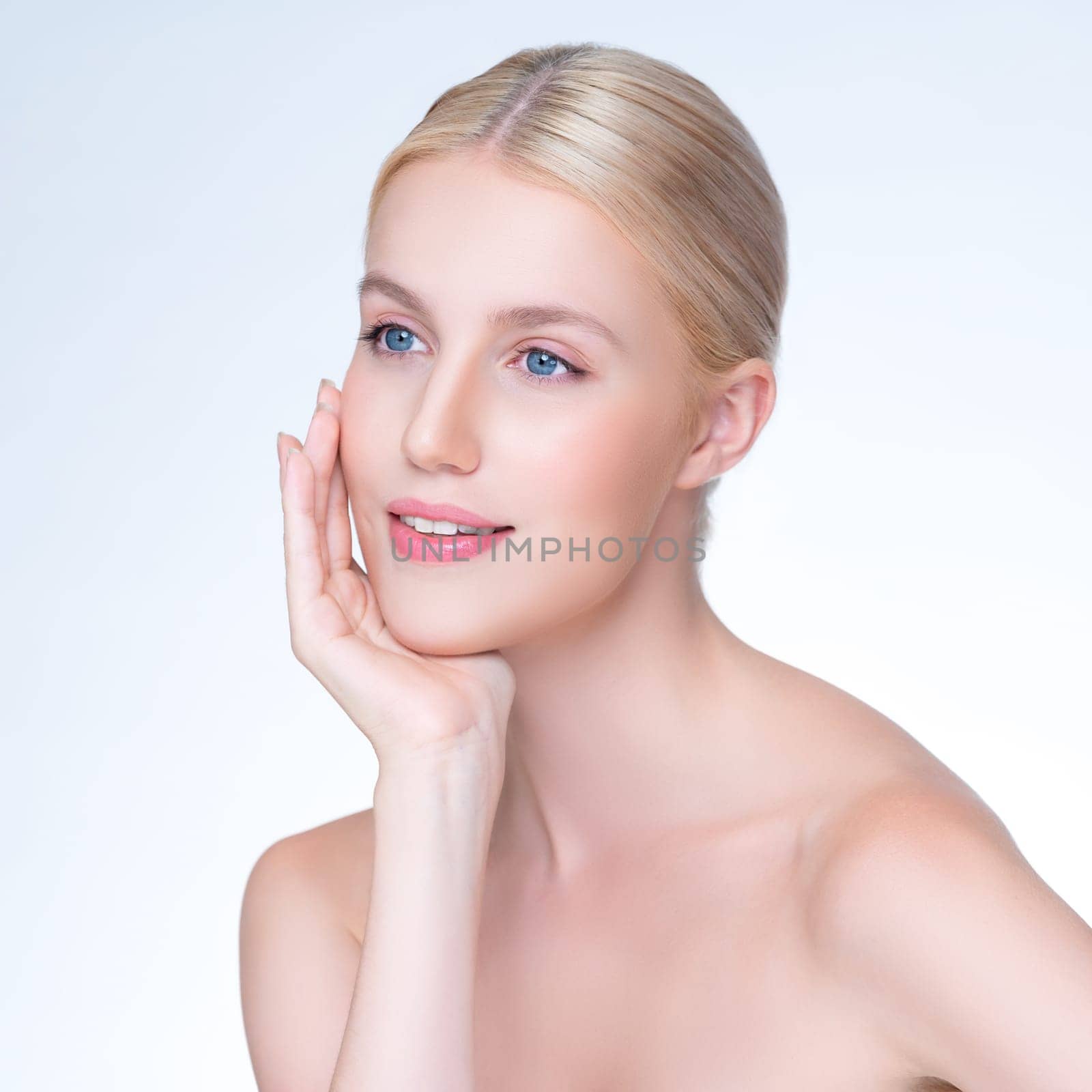 Personable beautiful woman portrait with perfect smooth clean skin and natural makeup portrait in isolated background. Hand gesture with expressive facial expression for beauty model concept.