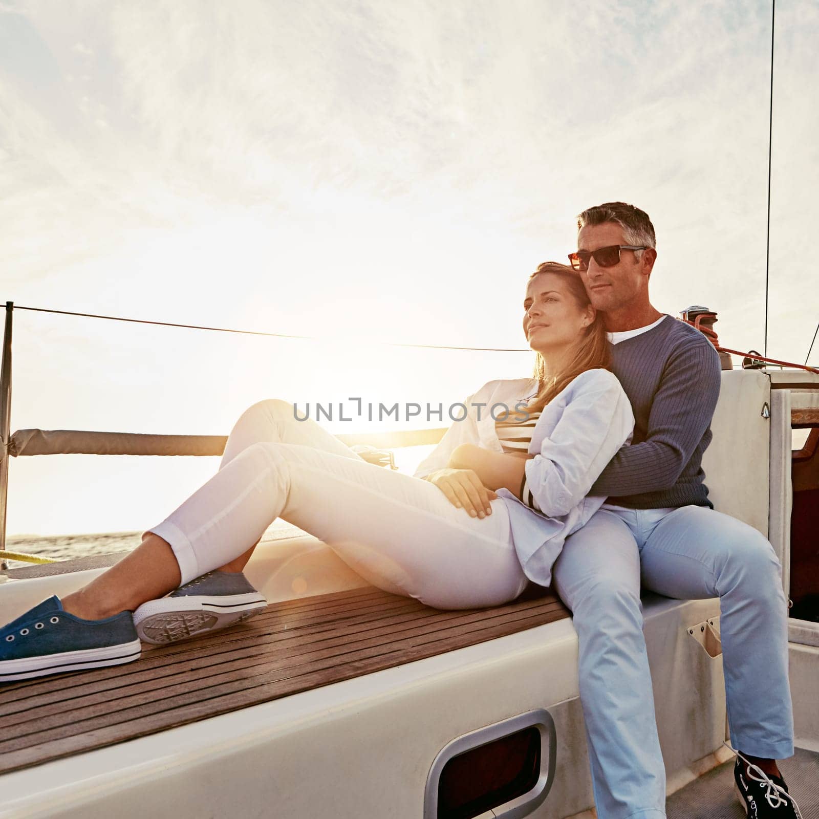 Our marriage feels like the safest place on earth. a couple enjoying a boat cruise out on the ocean