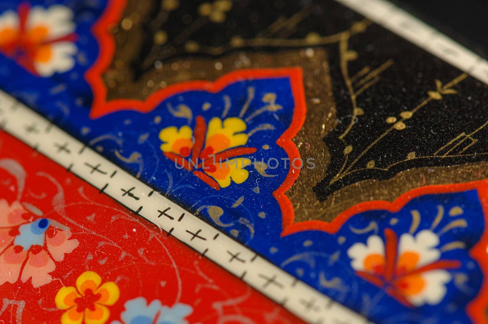 A closeup of a colorful artistic painting on a box. Central Asia, Uzbekistan by A_Karim