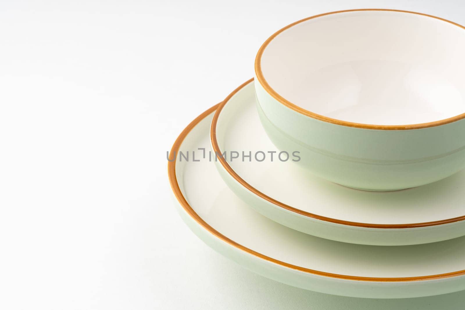 A set of ceramic tableware isolated on white background by A_Karim