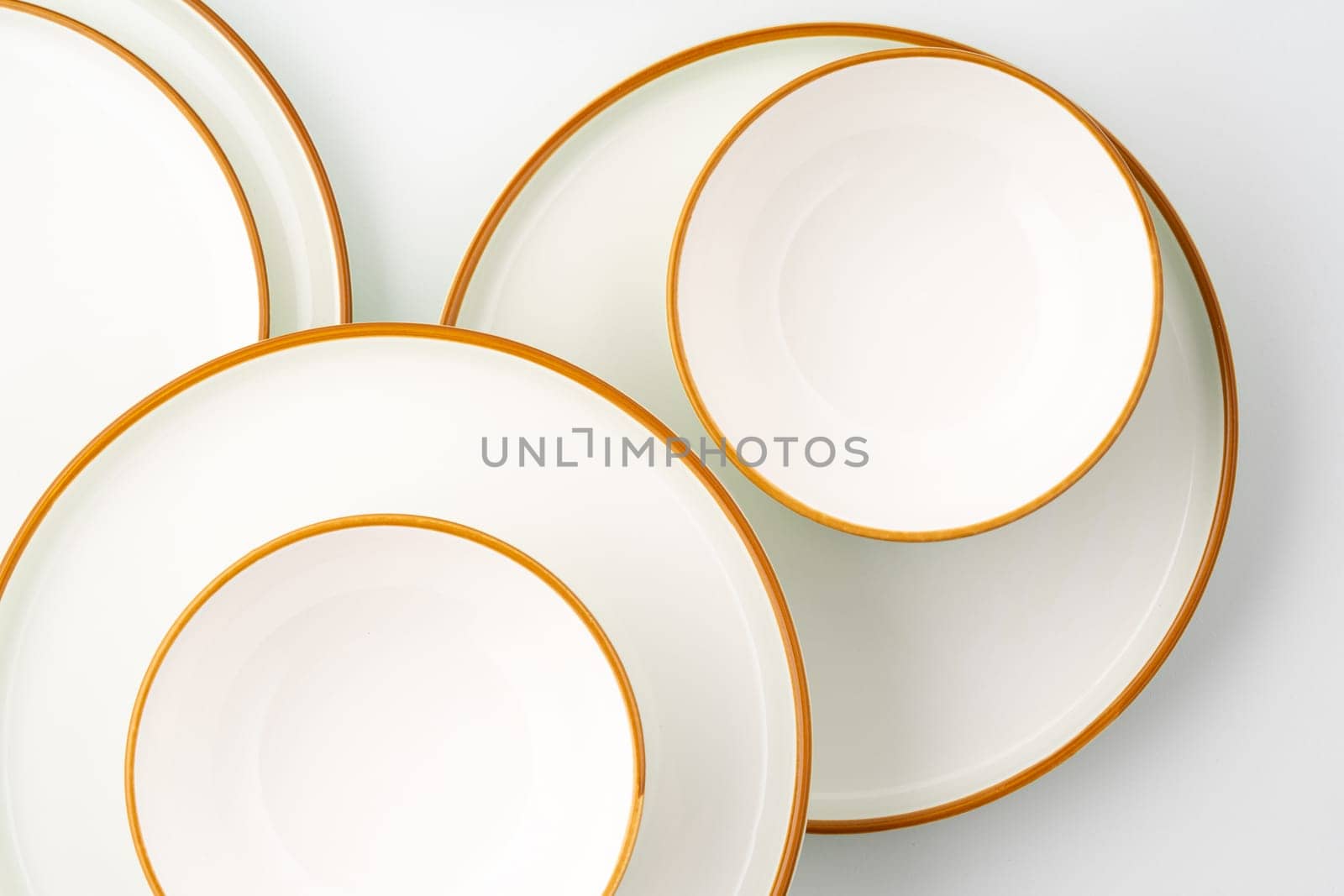 A set of ceramic tableware isolated on white background