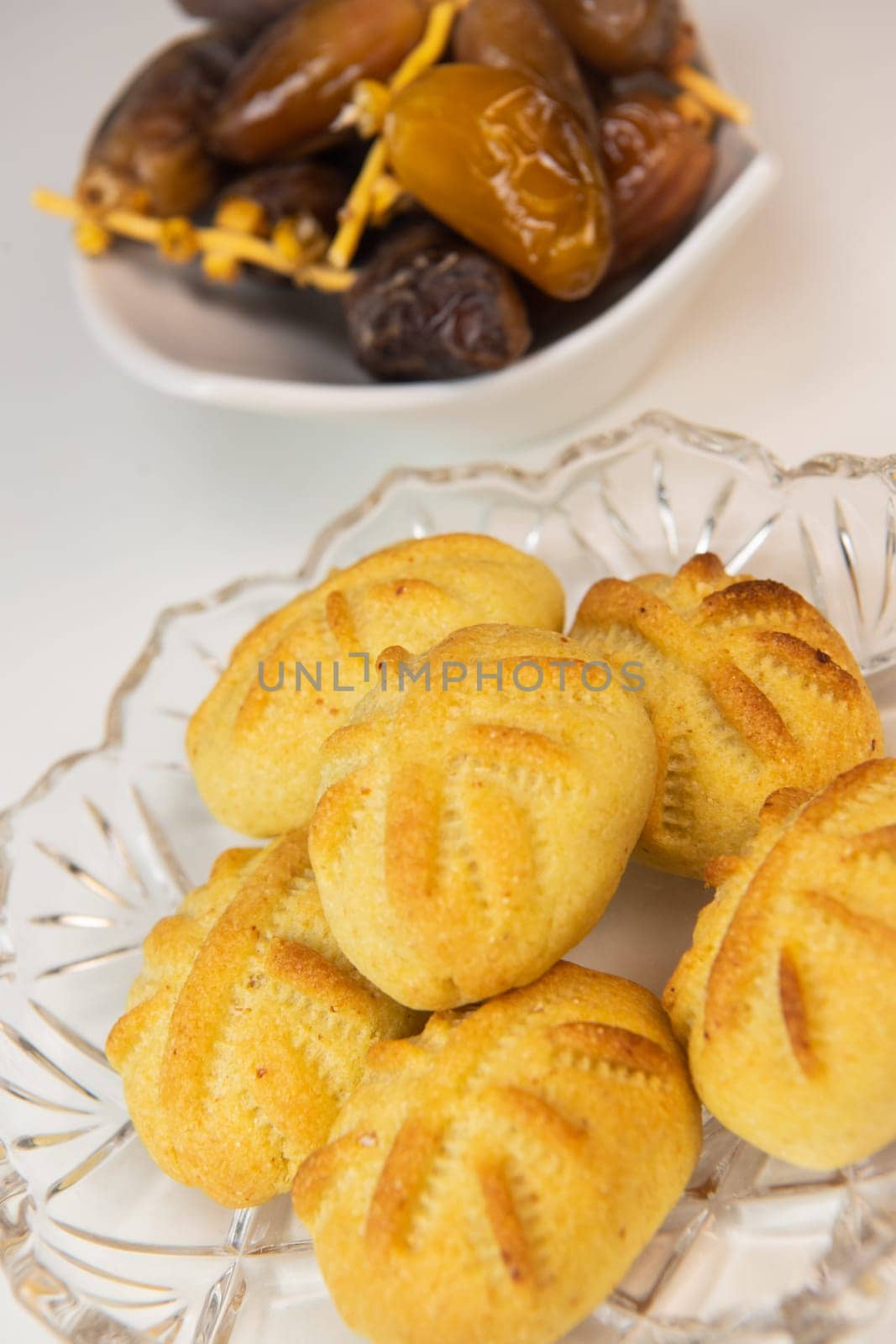 Traditional eid maamoul or mamoul cookies with dates, nuts, and jam, Arabic sweets for Aid al-Fitr and easter, High quality photo