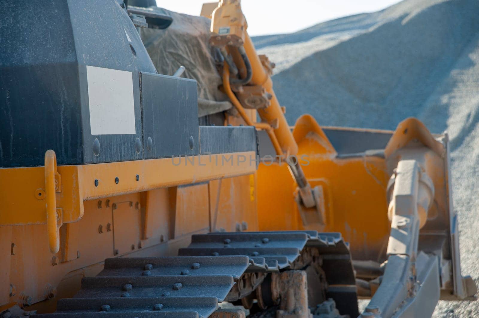 A closeup tractor working in a industrial construction area