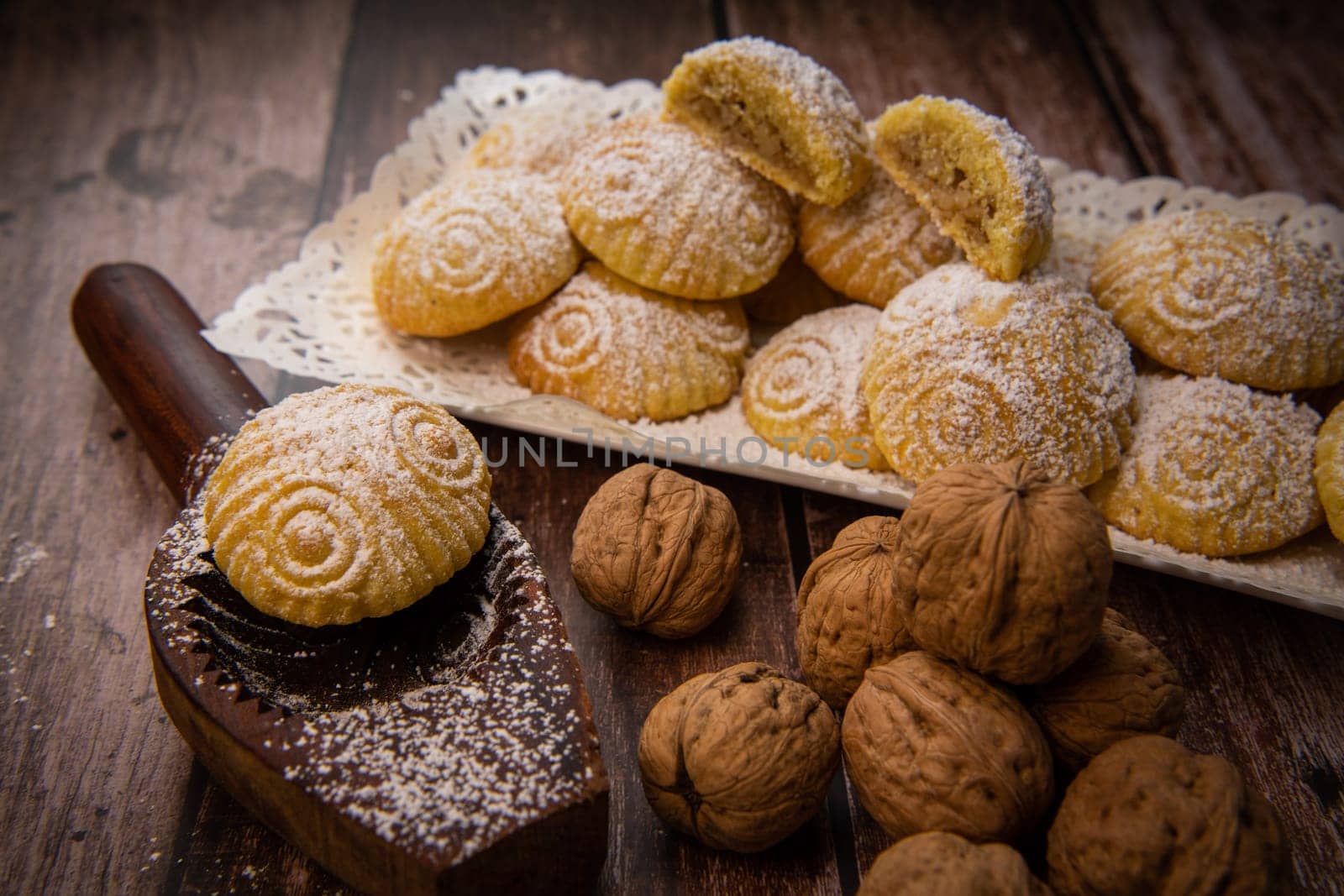 Traditional eid maamoul or mamoul cookies with dates, nuts, and jam, Arabic sweets for Aid al-Fitr and easter, High quality photo