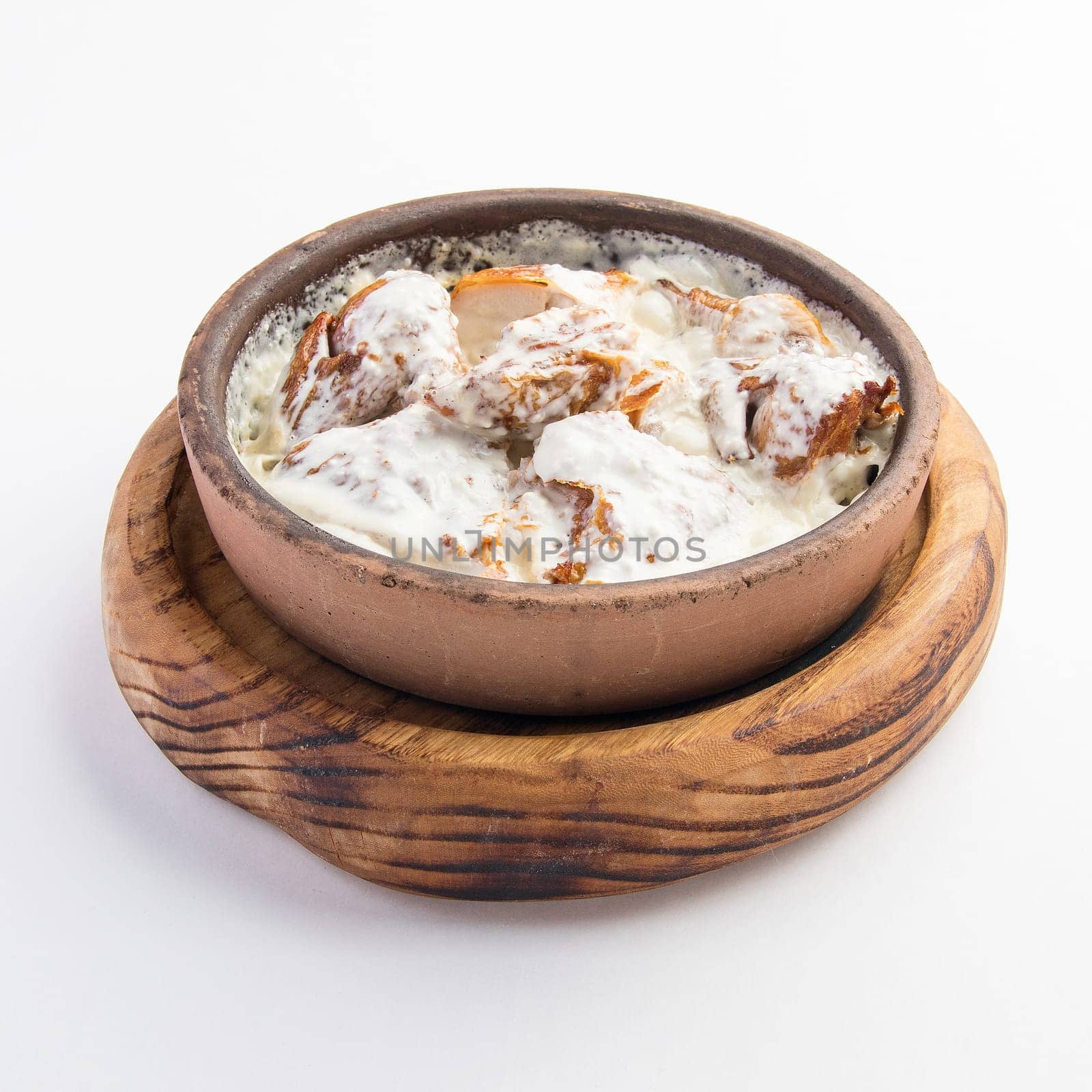A beautiful shot of a bowl of chmeruli by A_Karim